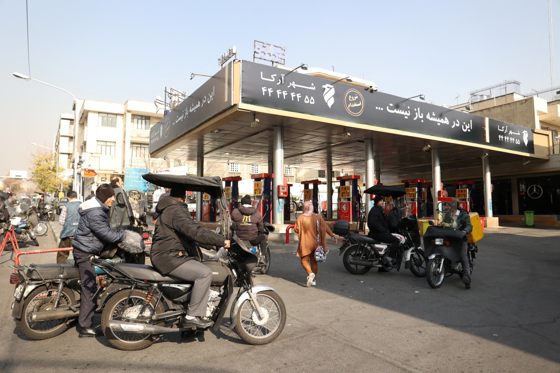 <p>People wait at a gas station during gas station disruption in Tehran, Iran on December 18, 2023.</p>