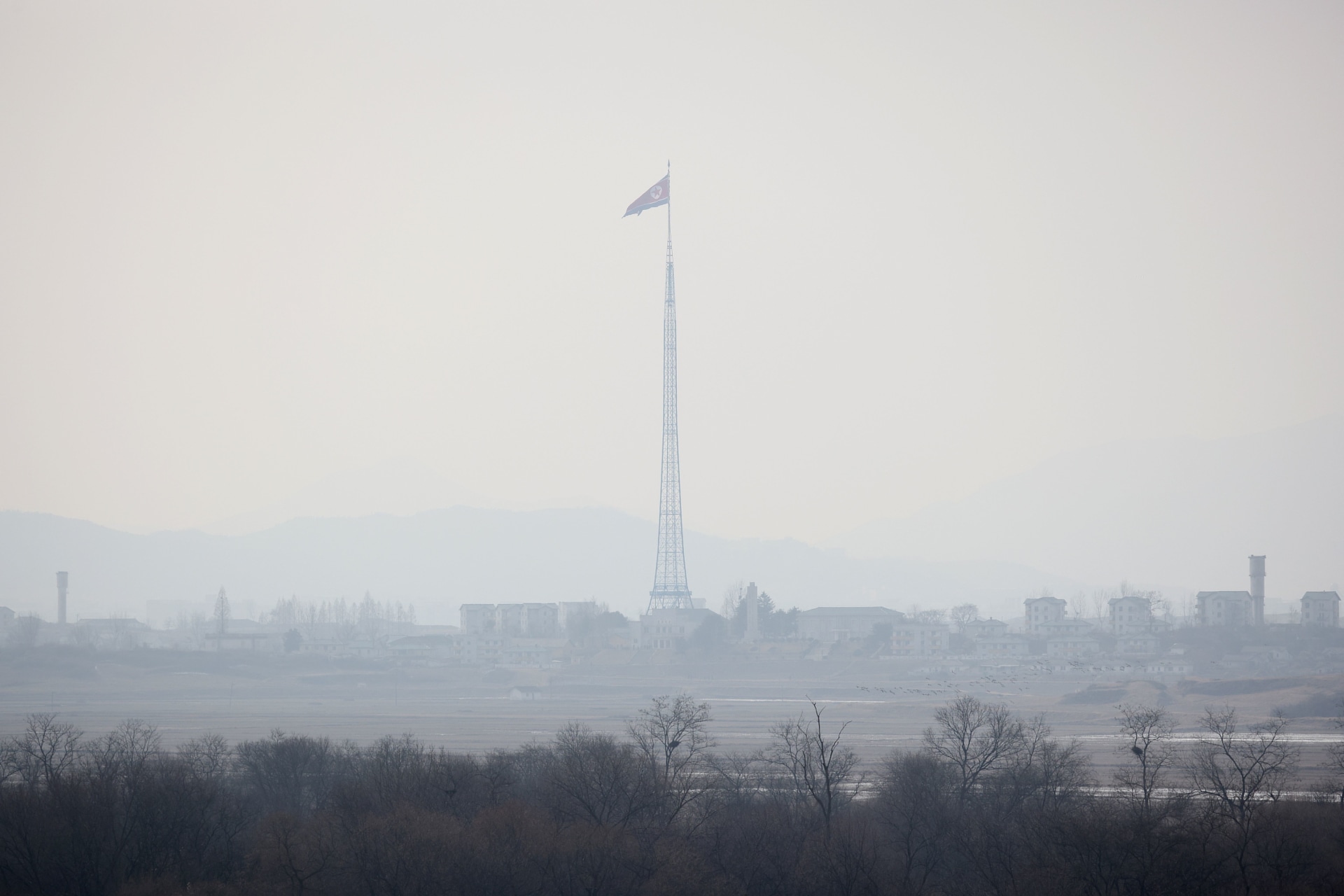 <p>A North Korean flag flutters at the propaganda village of Gijungdong in North Korea, in this picture taken inside the demilitarized zone separating the two Koreas on February 7, 2023.</p>