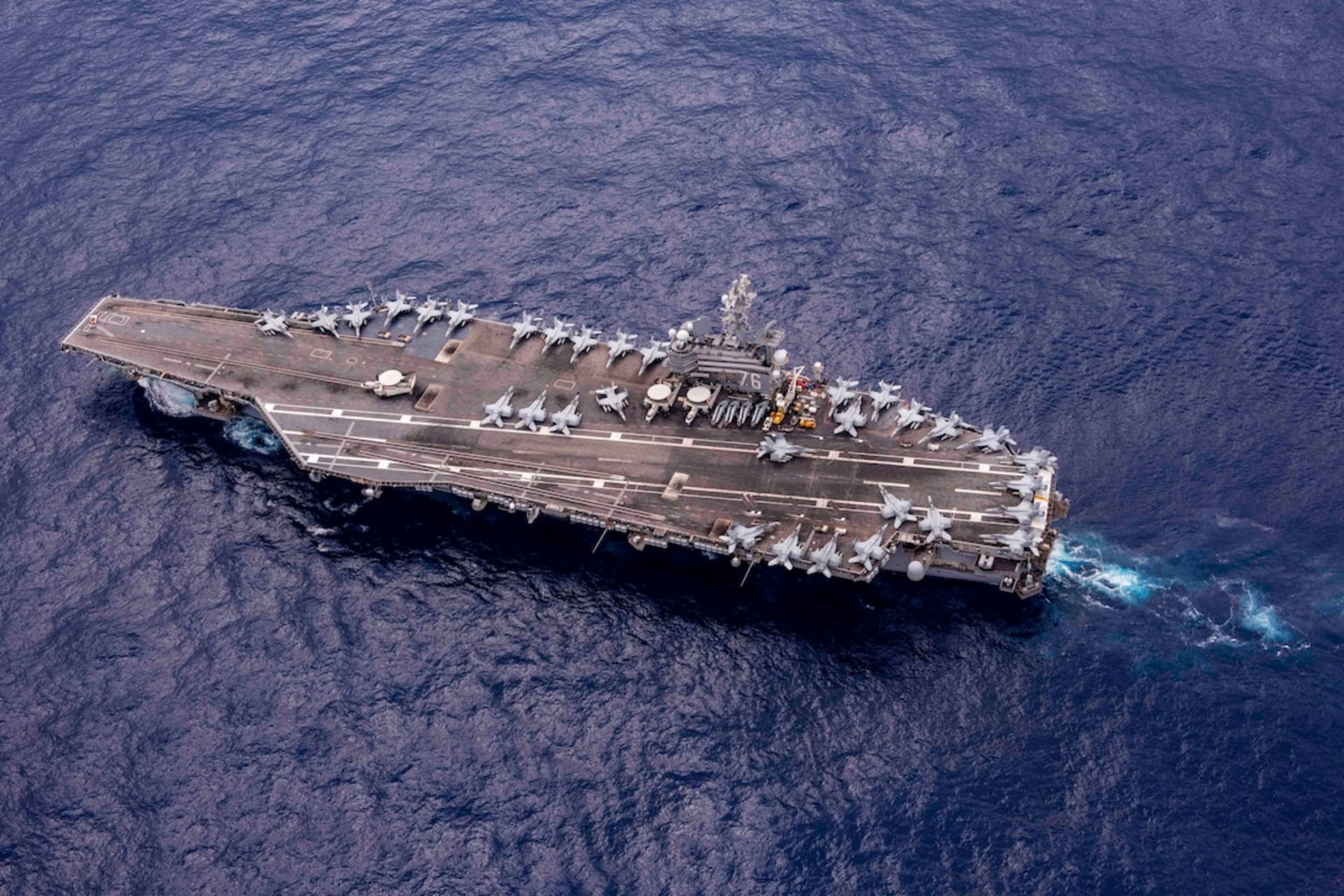<p>The USS Ronald Reagan transits the Philippine Sea on October 4, 2023.</p>

