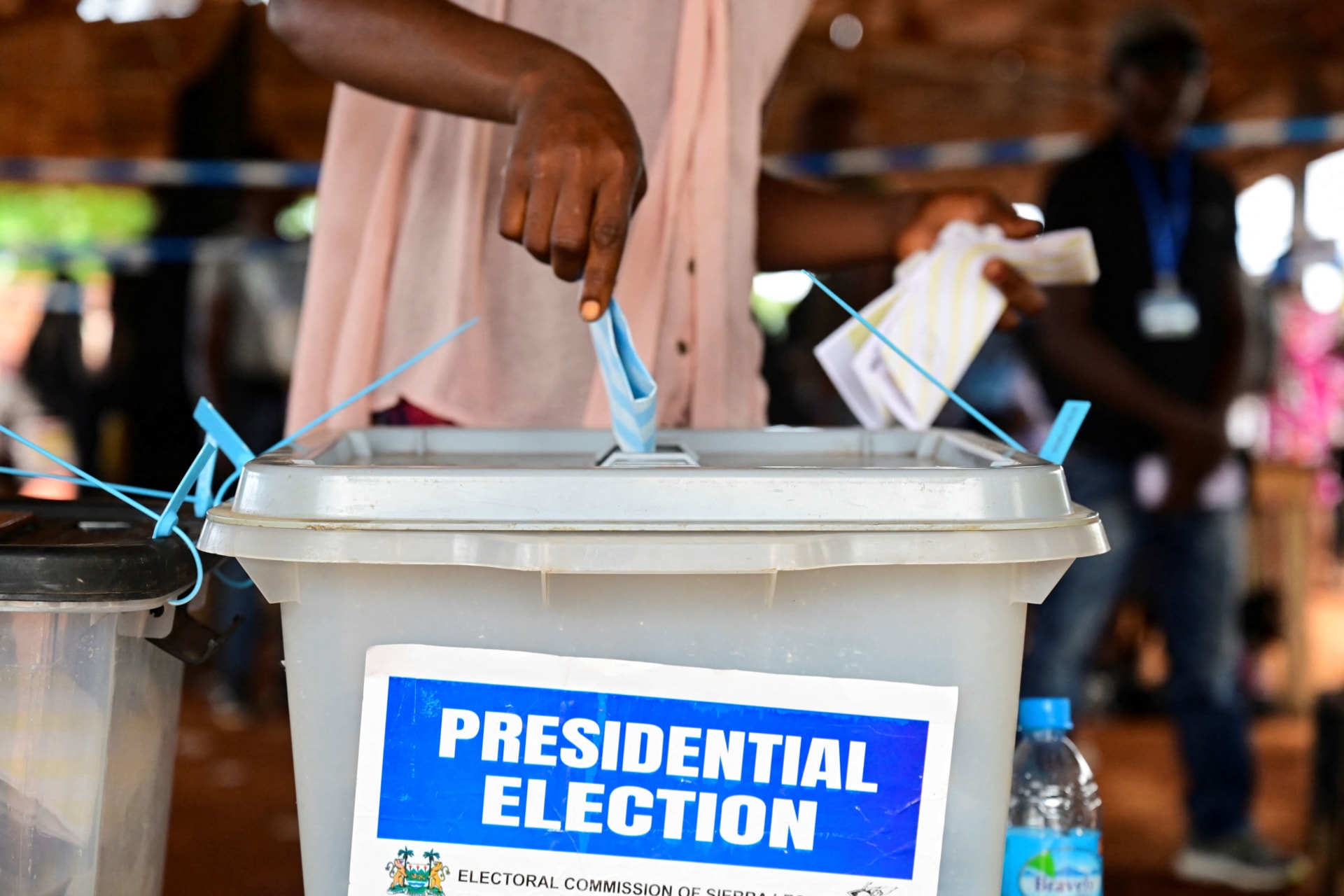 <p>A voter casts their ballot for the national election at a polling station in Freetown, Sierra Leone on June 24, 2023.</p>
