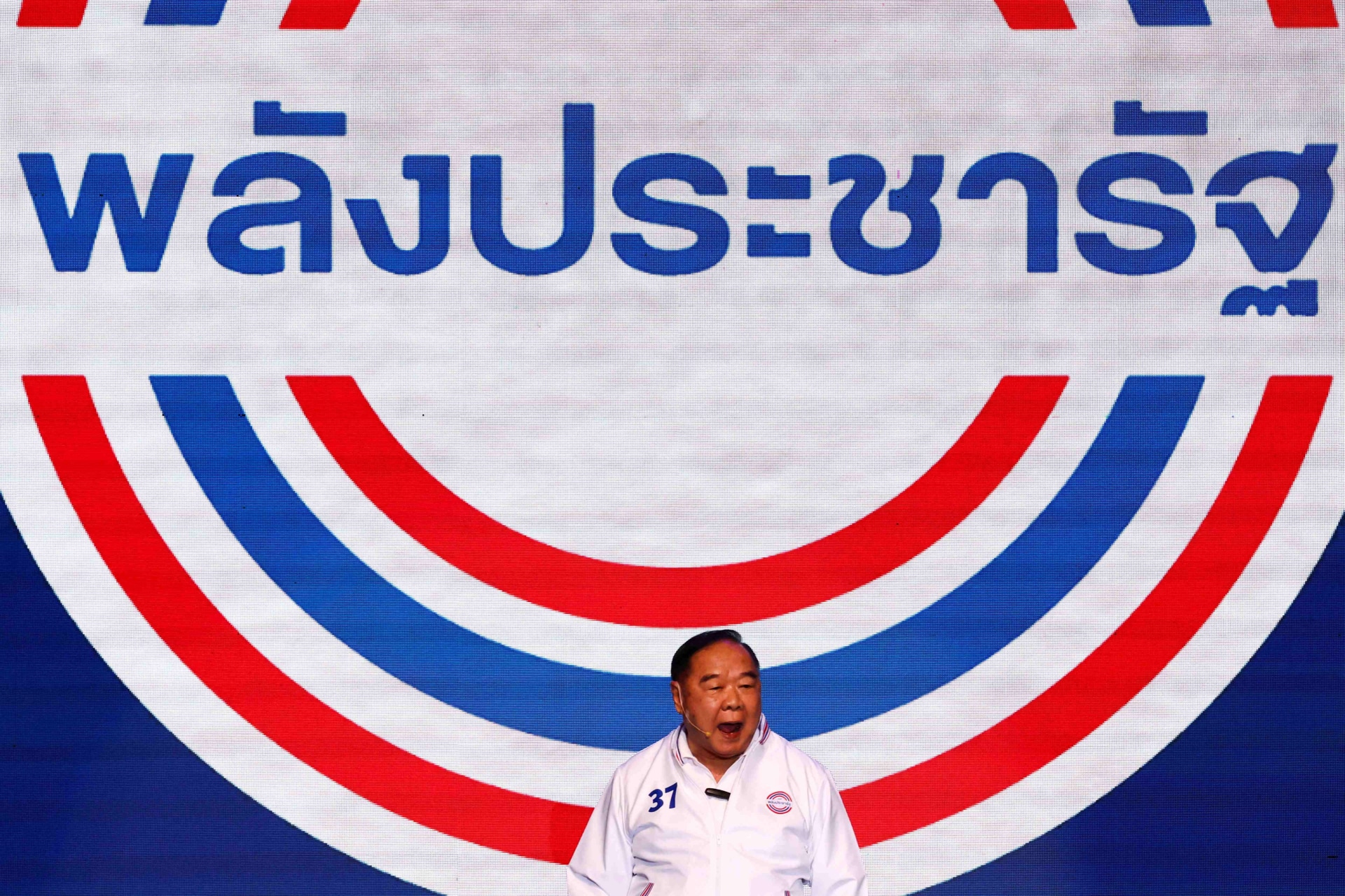 <p>Palang Pracharat party’s candidate for prime minister, Prawit Wongsuwan, gestures from a stage during a major rally event ahead of the general election in Bangkok, Thailand, on May 12, 2023.</p>
