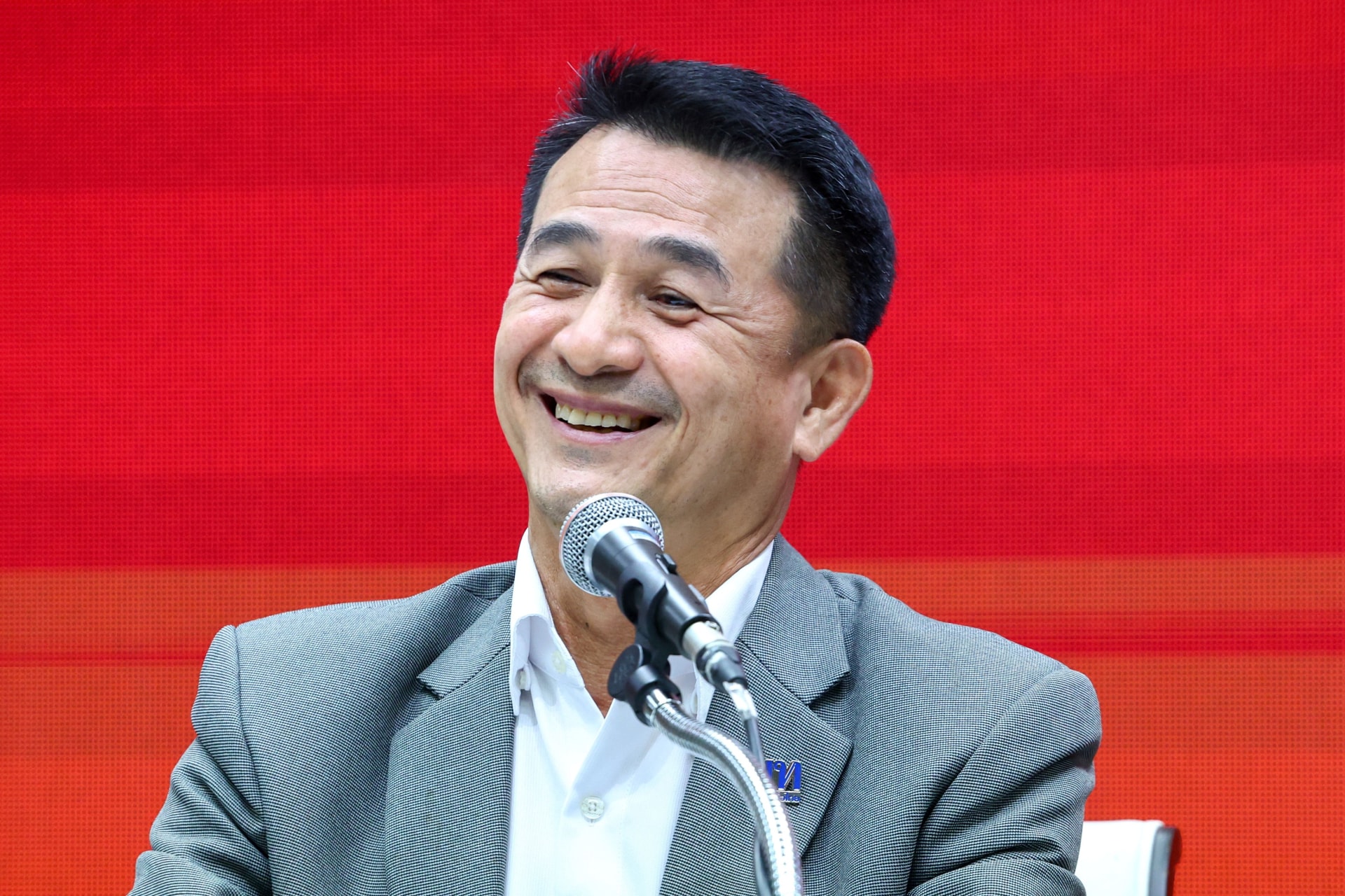 <p>Pheu Thai Party leader Chonlanan Srikaew smiles during a press conference discussing the exit of Thailand’s election-winning Move Forward Party from a coalition of parties in Bangkok, Thailand, on August 2, 2023.</p>
