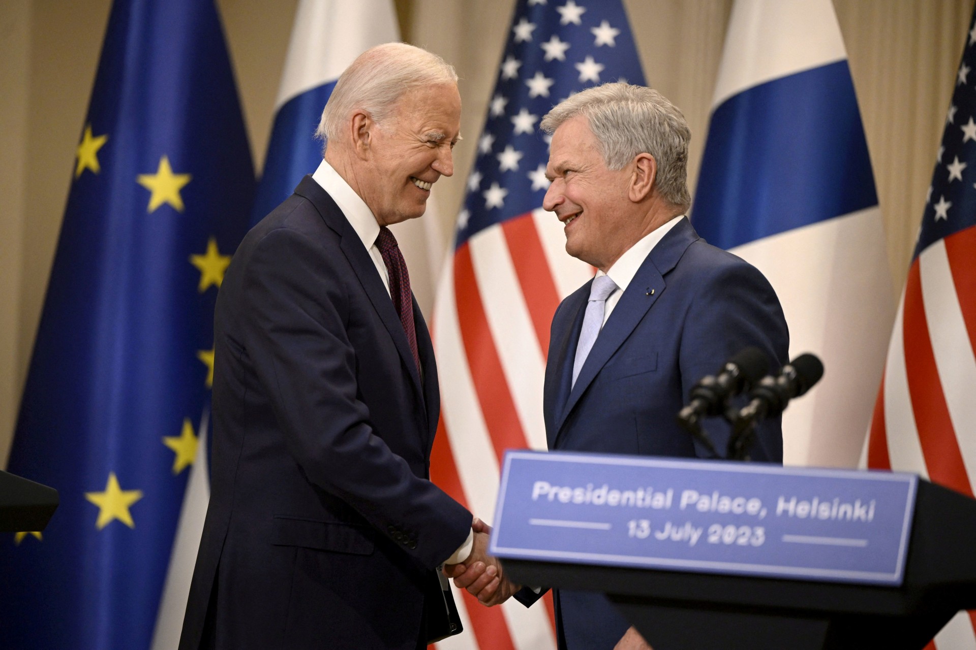 <p>US President Joe Biden and Finnish President Sauli Niinisto shake hands at the end of their joint press conference in Helsinki, Finland, on July 13, 2023. </p>