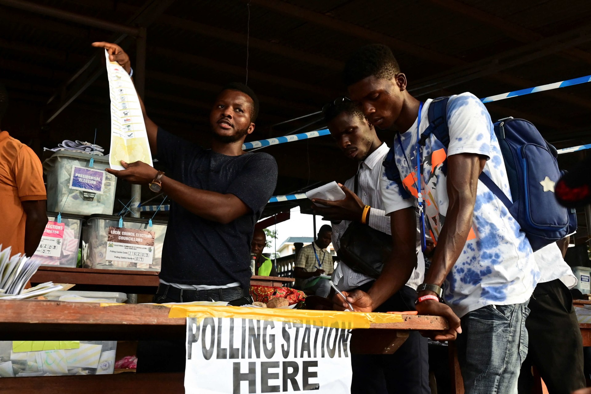<p>Election workers count ballots at a polling station, after polls closed, on the day of the national election, in Freetown, Sierra Leone on June 24, 2023.</p>