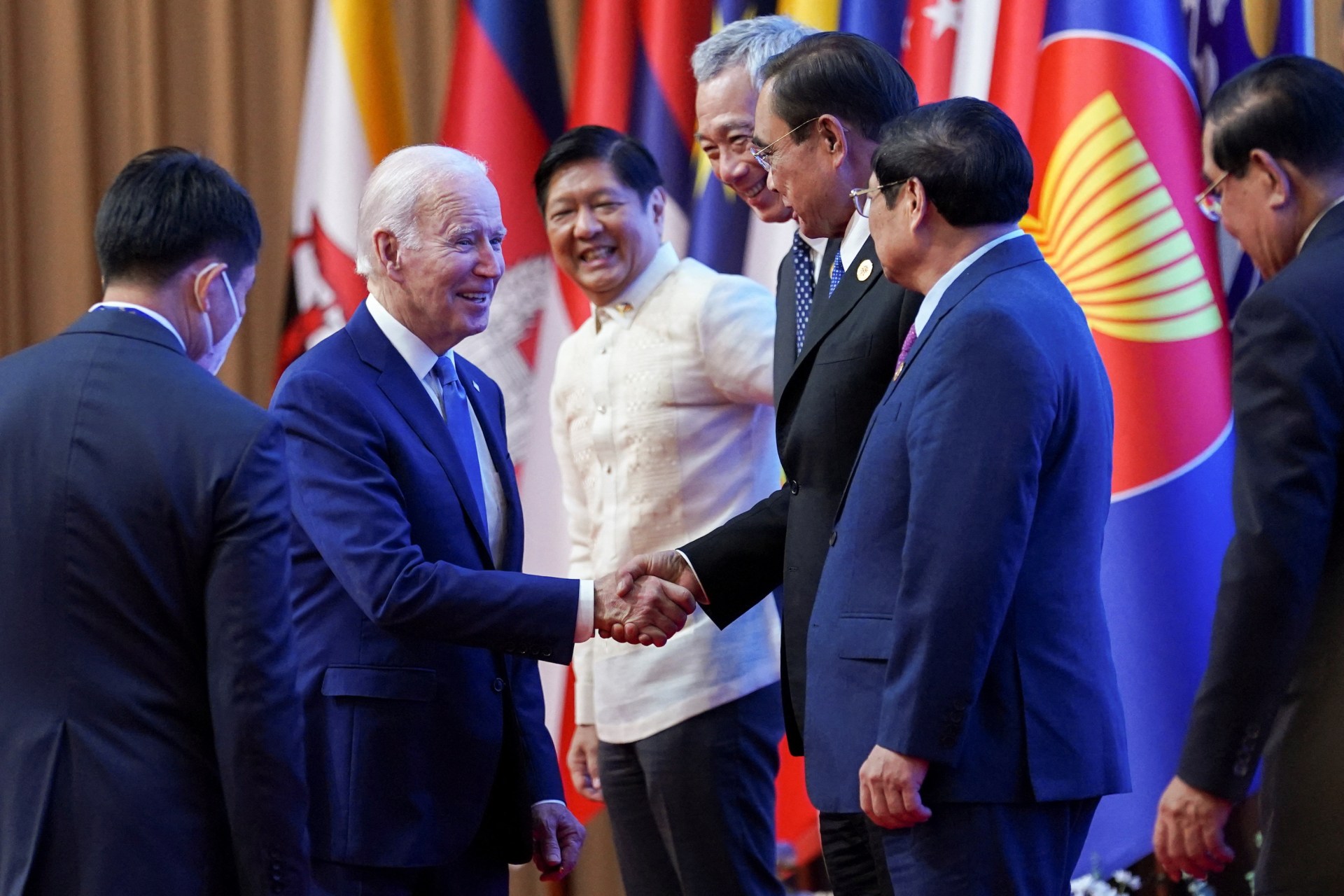 <p>U.S. President Joe Biden greets other leaders during the 2022 ASEAN summit in Phnom Penh, Cambodia, on November 12, 2022.</p>
