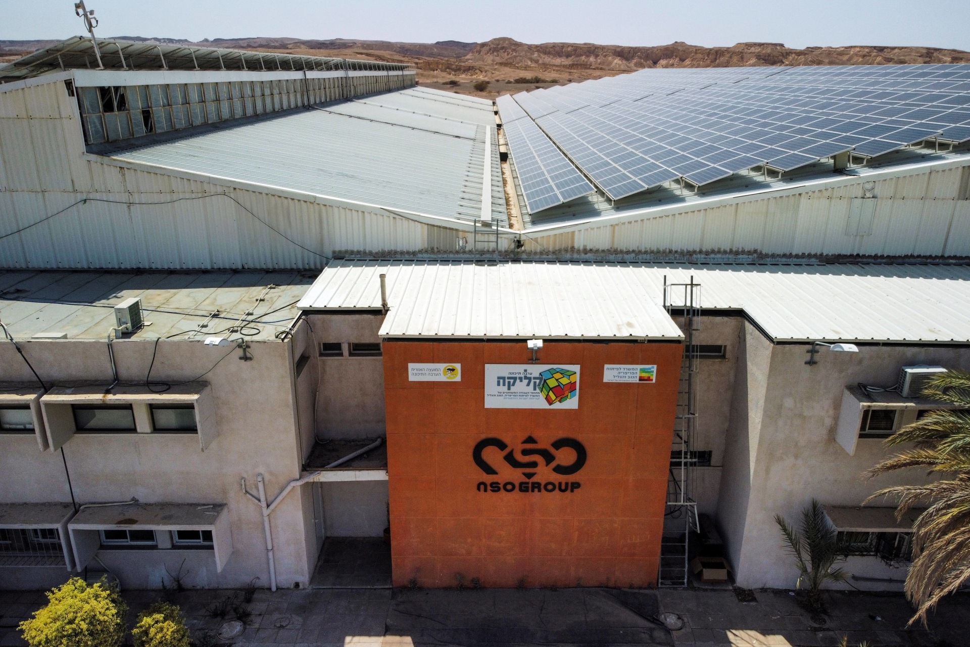 <p>An aerial view shows the logo of Israeli cyber firm NSO Group at one of its branches in the Arava Desert, southern Israel.</p>
