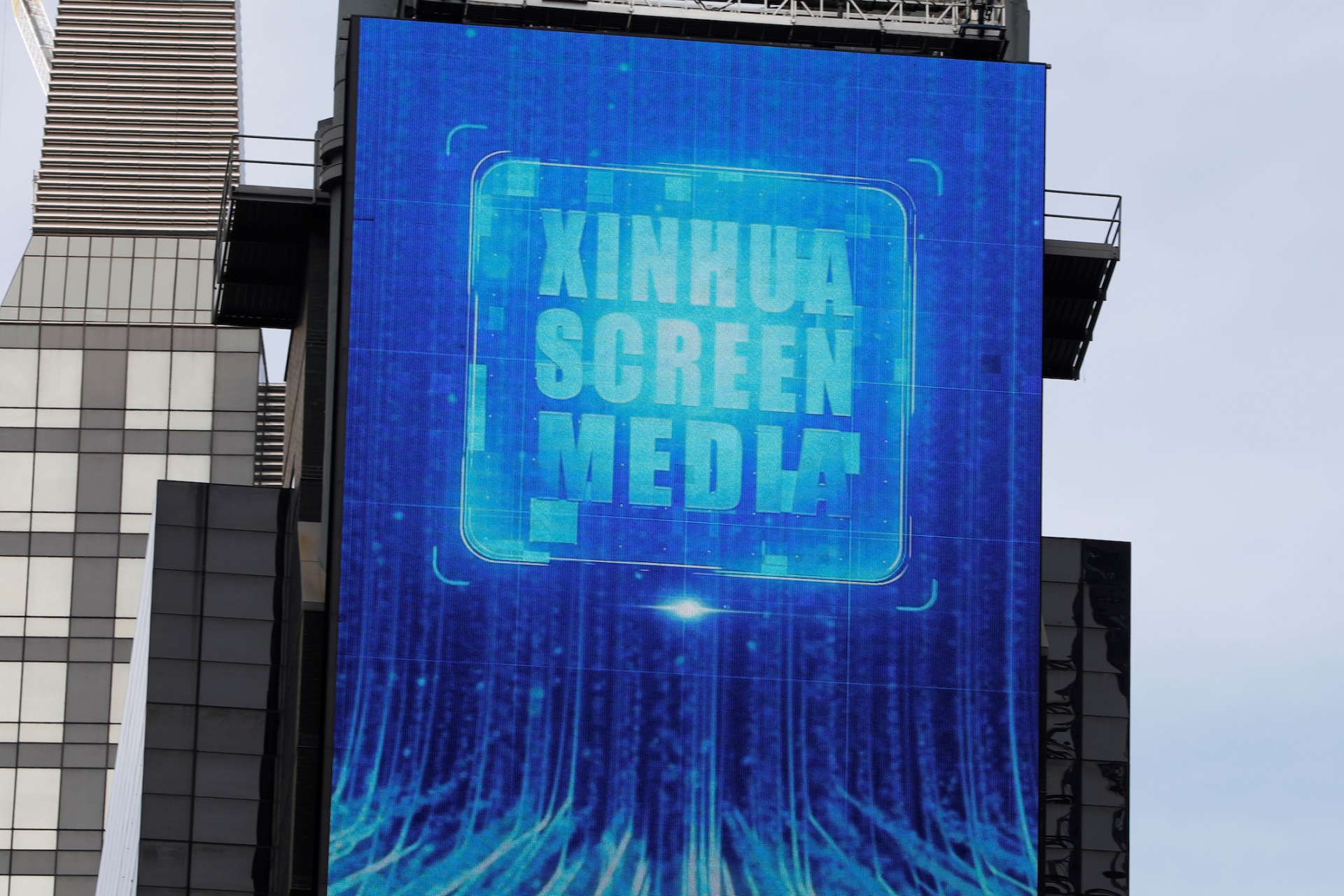<p>A screen advertising Xinhua News Agency is seen in Times Square in the Manhattan borough of New York City, March 2, 2020.</p>
