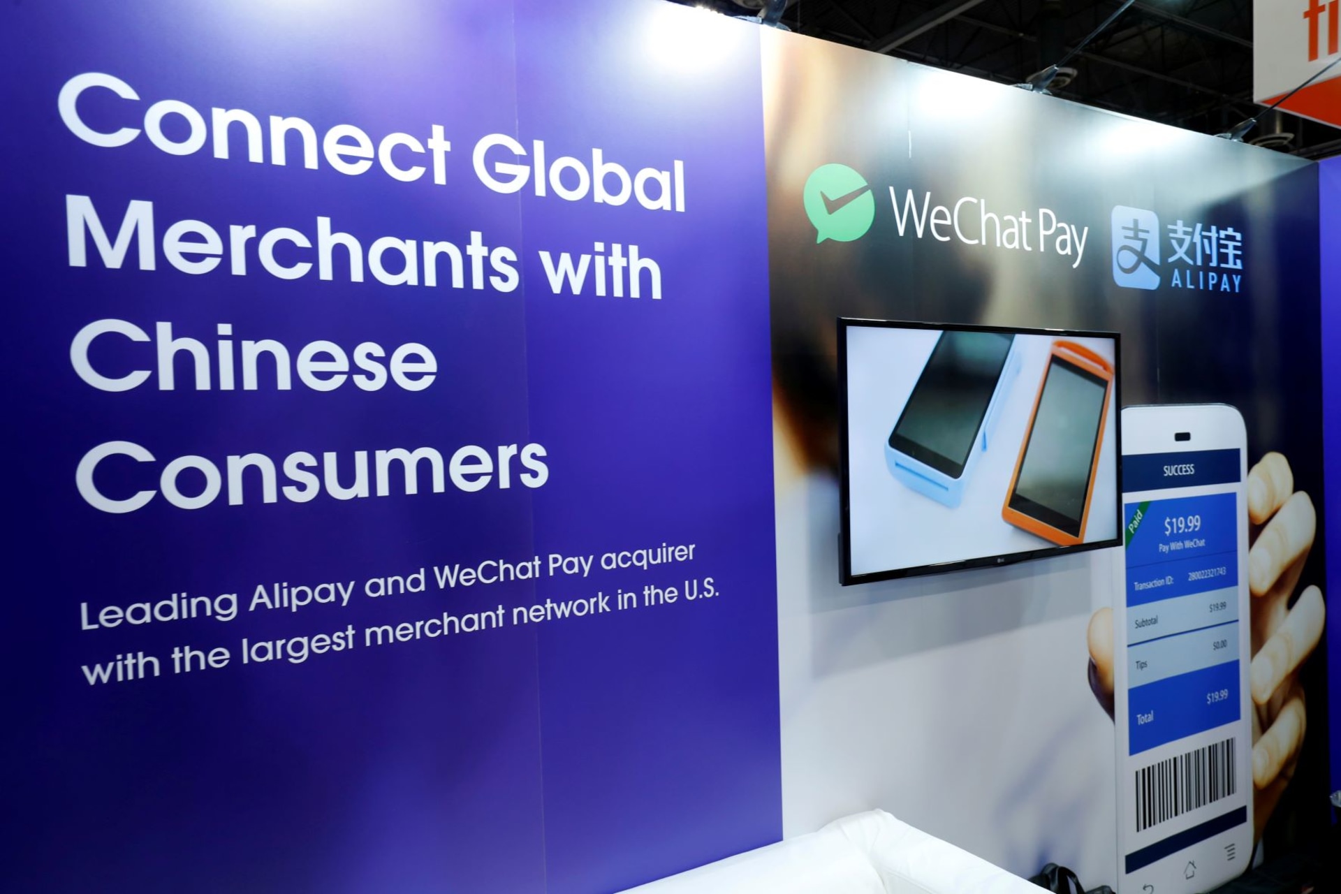 <p>A display at the Citcon booth promotes WeChat Pay and Alipay during the Money 20/20 conference in Las Vegas, Nevada, on October 24, 2017.</p>
