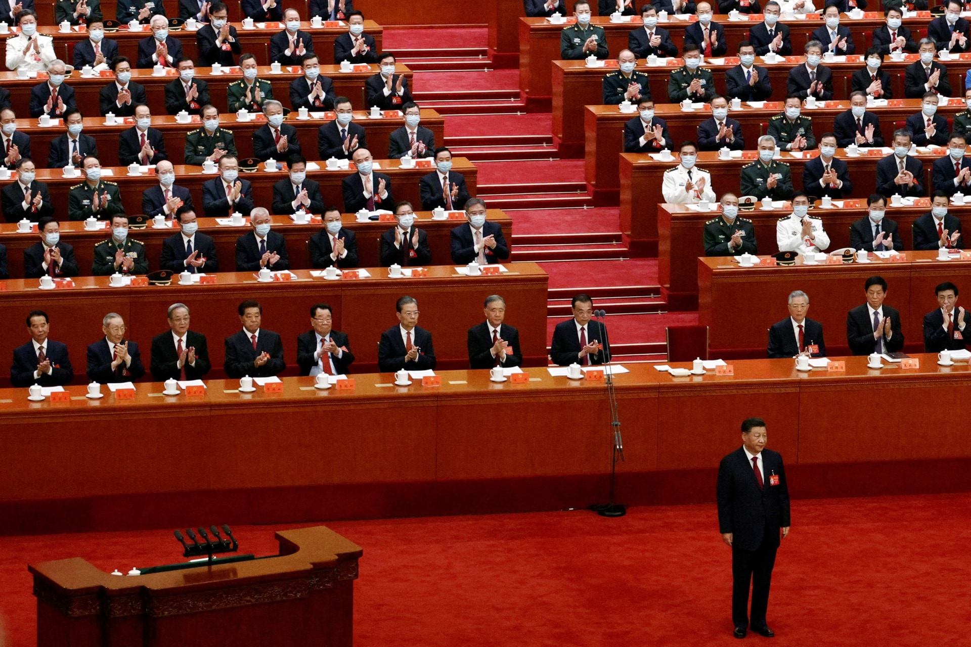 <p>Chinese leader Xi Jinping stands at the opening ceremony of the 20th National Congress of the Chinese Communist Party on October 16, 2022.</p>
