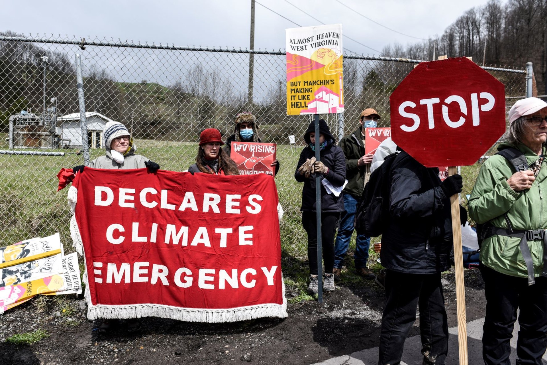 <p>Protesters gather outside a coal plant in Grant Town, WV in April, 2022.</p>