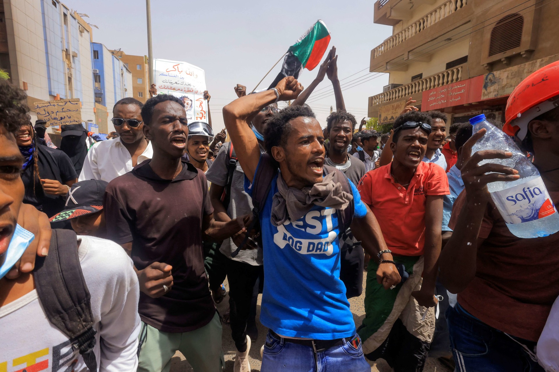 <p>Protesters march during a rally against military rule following a coup in Khartoum, Sudan on May 12,2022.</p>

