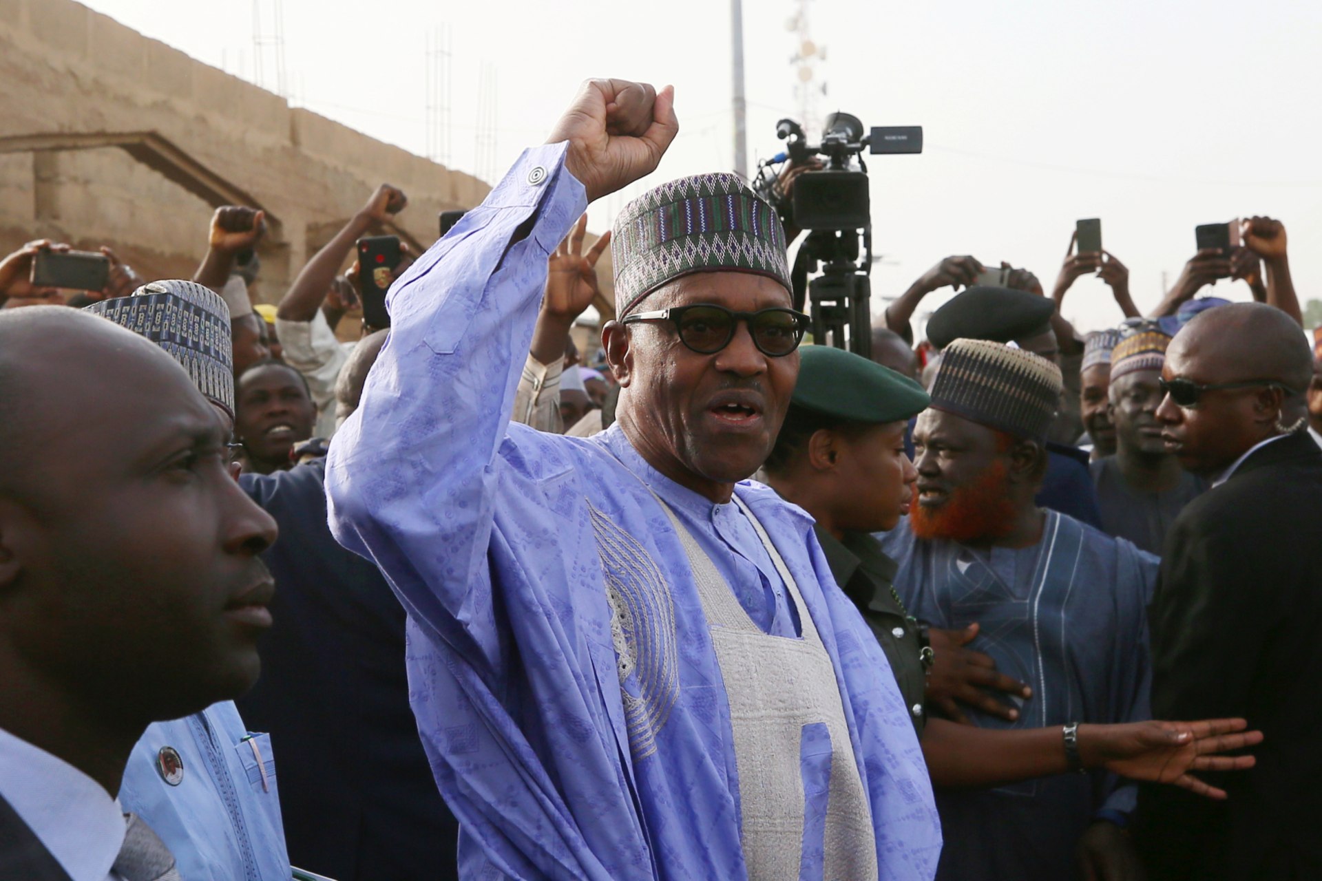 <p>Nigerian President Muhammadu Buhari gestures as he arrives to cast a vote in Nigeria’s last presidential election in Katsina State, Nigeria, on February 23, 2019.</p>