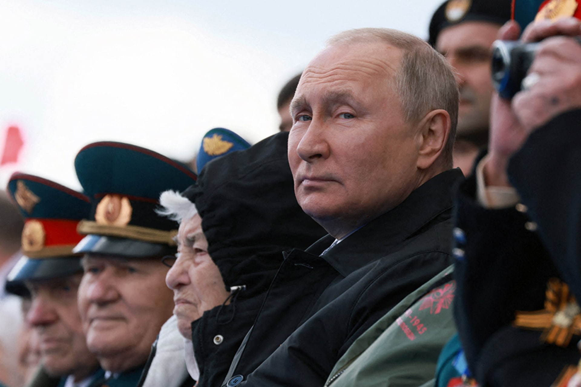 <p>Russian President Vladimir Putin watches a military parade on Victory Day in central Moscow, Russia May 9, 2022.</p>