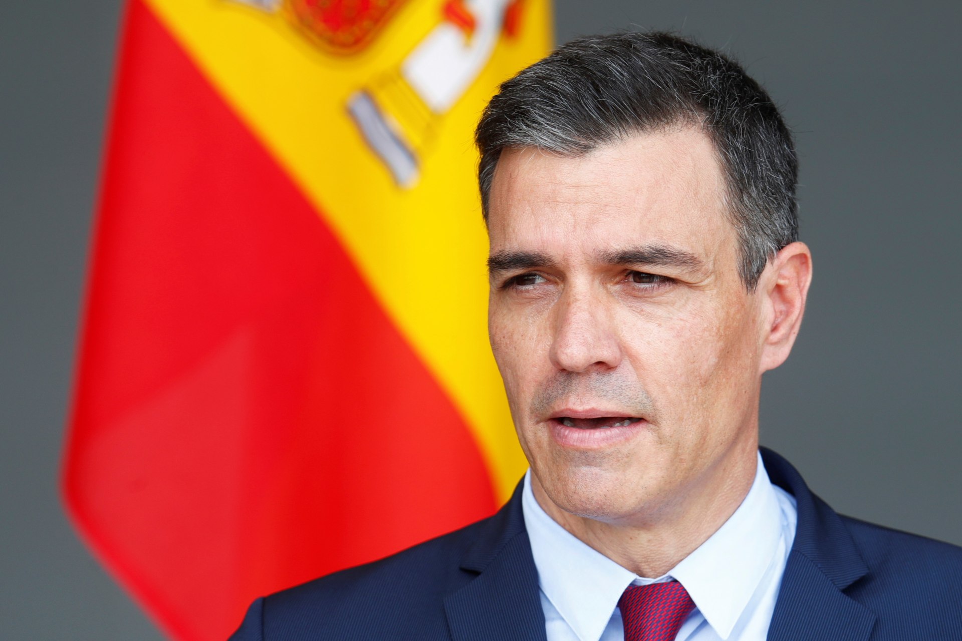 <p>Spanish Prime Minister Pedro Sanchez speaks at a Lithuanian airbase in July 2021.</p>
