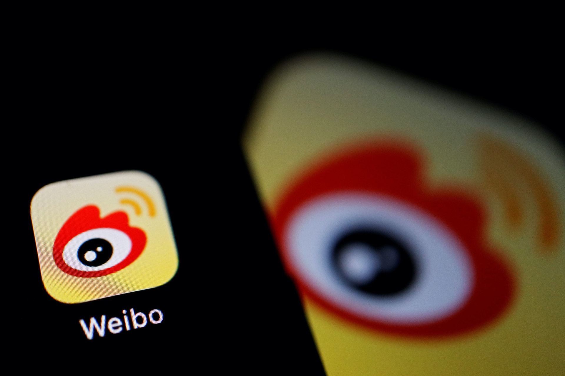 <p>The logo of Chinese social media app Weibo is seen on a mobile phone in this illustration picture taken December 7, 2021.</p>
