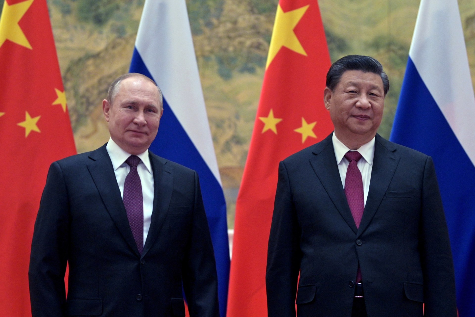 <p>Russian President Vladimir Putin attends a meeting with Chinese President Xi Jinping in Beijing, China, on February 4, 2022.</p>
