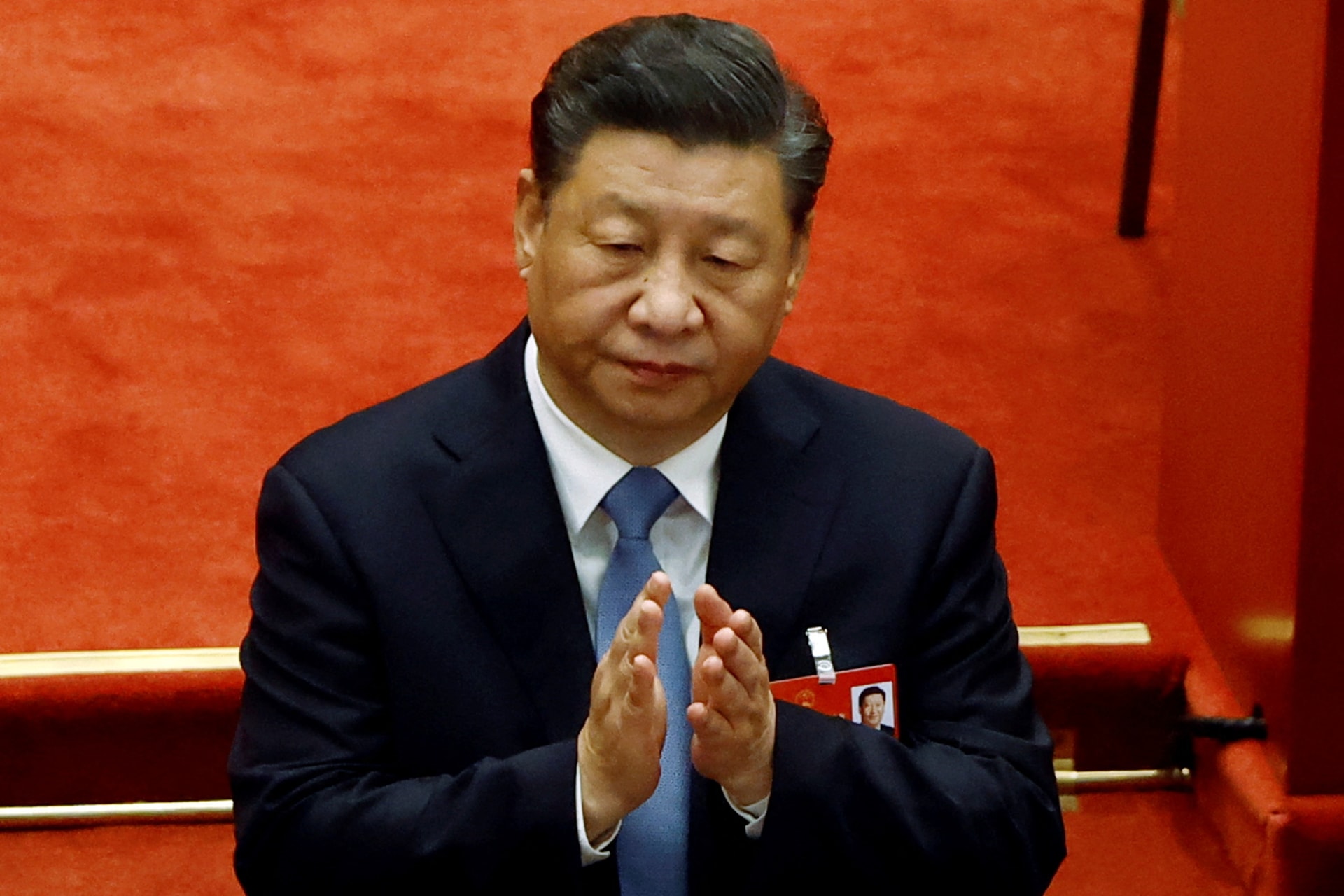 <p>Chinese President Xi Jinping applauds at the opening session of the National People’s Congress (NPC) at the Great Hall of the People in Beijing, China, on March 5, 2022.</p>
