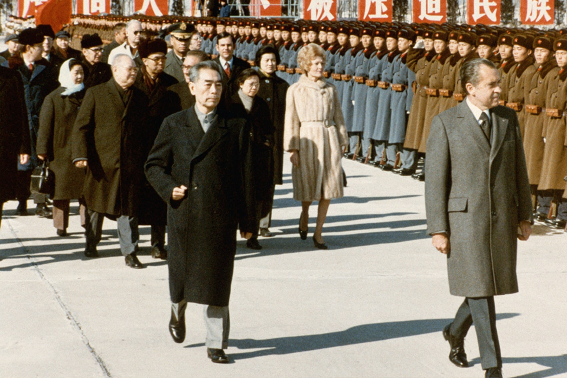 <p>President Nixon inspects assembled Chinese soldiers with Premier Zhou Enlai.</p>
