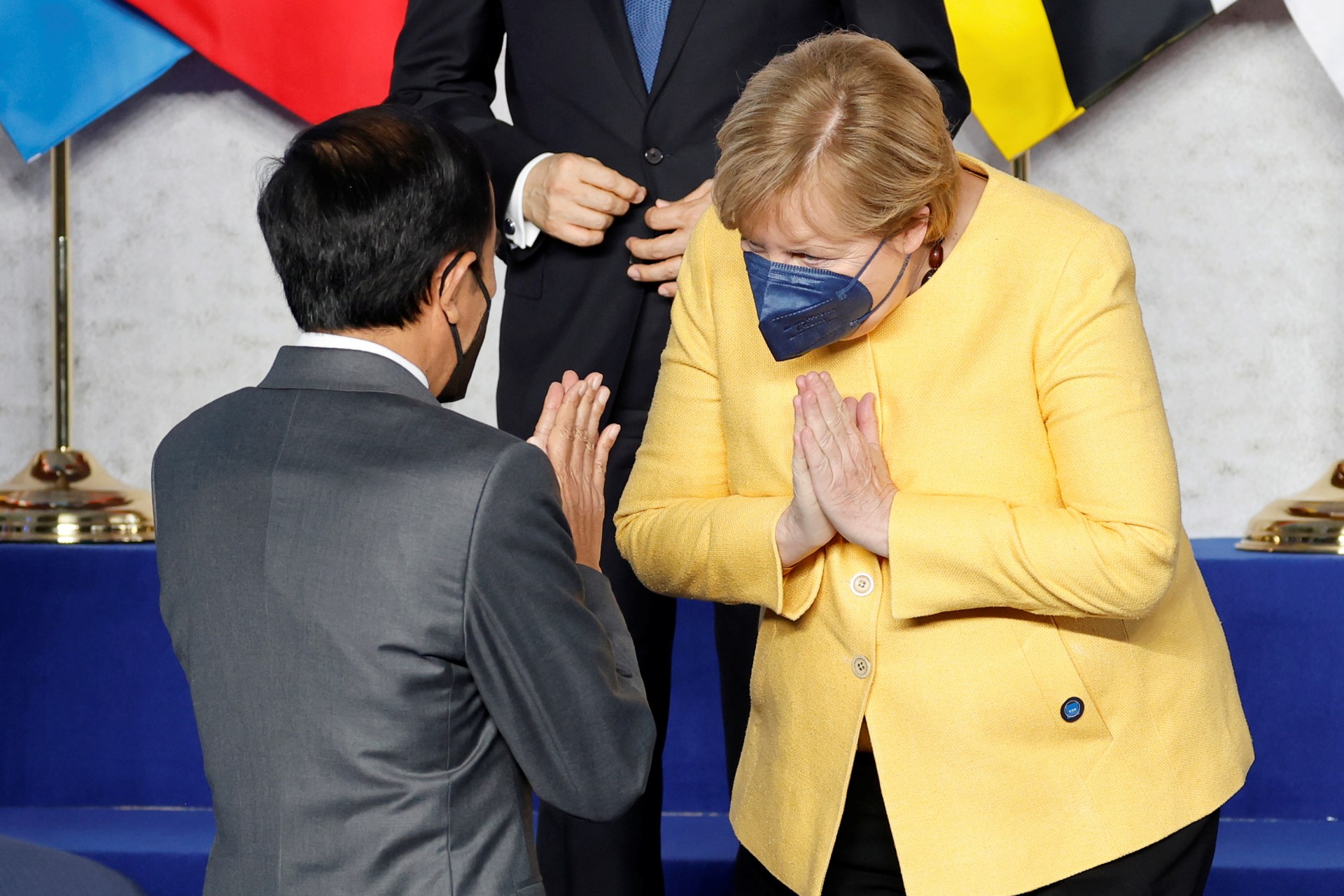 <p>German Chancellor Angela Merkel greets Indonesia’s President Joko Widodo at the start of the G20 leaders summit at the convention center La Nuvola in Rome, Italy, on October 30, 2021.</p>