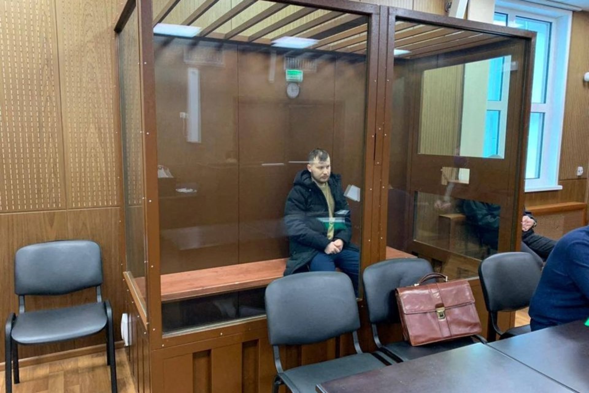 <p>Ruslan Khansvyarov, one of the suspected members of REvil detained by the FSB earlier this week, sits in court in Moscow.</p>