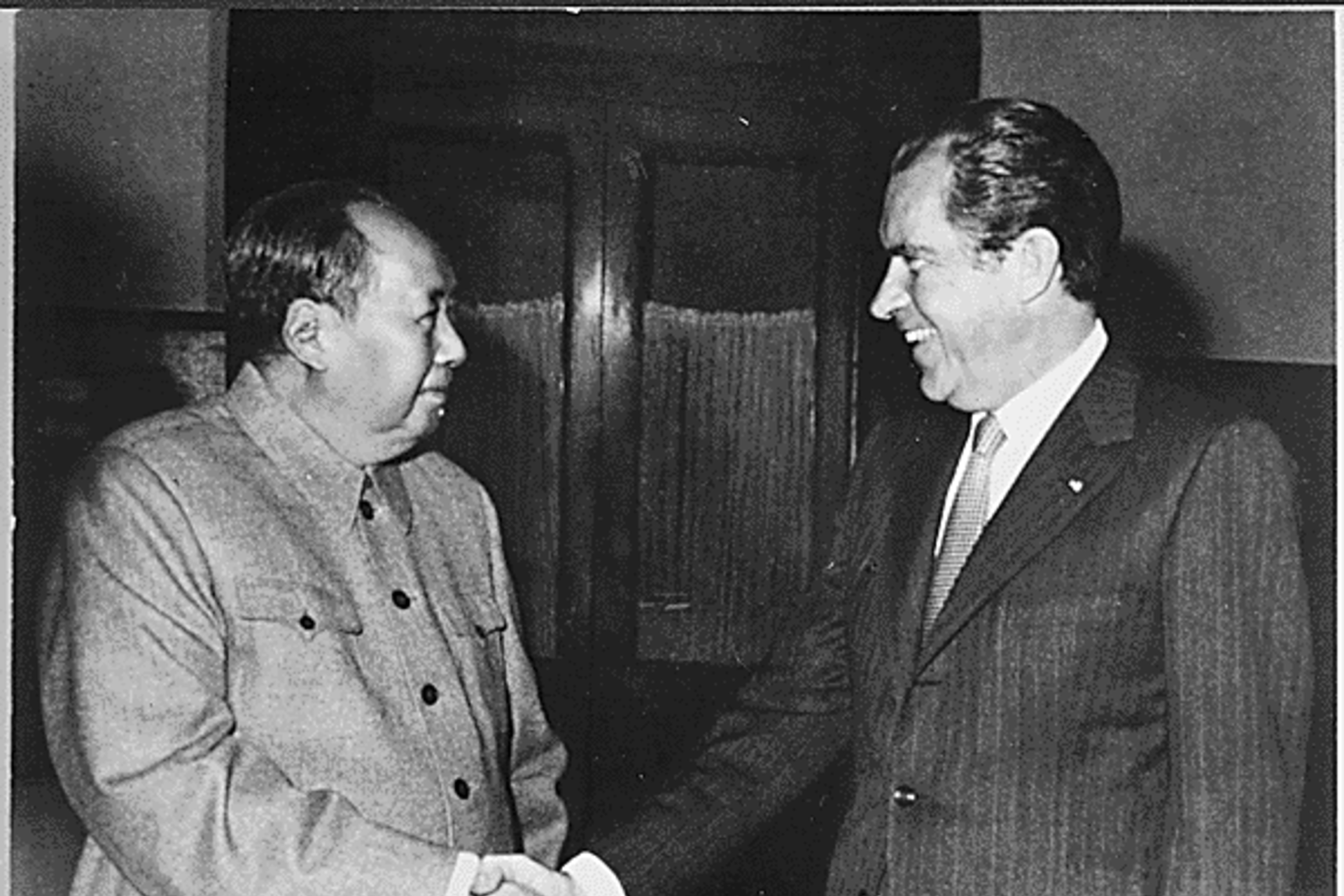 <p>President Richard Nixon and Chairman Mao Zedong shake hands on February 21, 1972.</p>