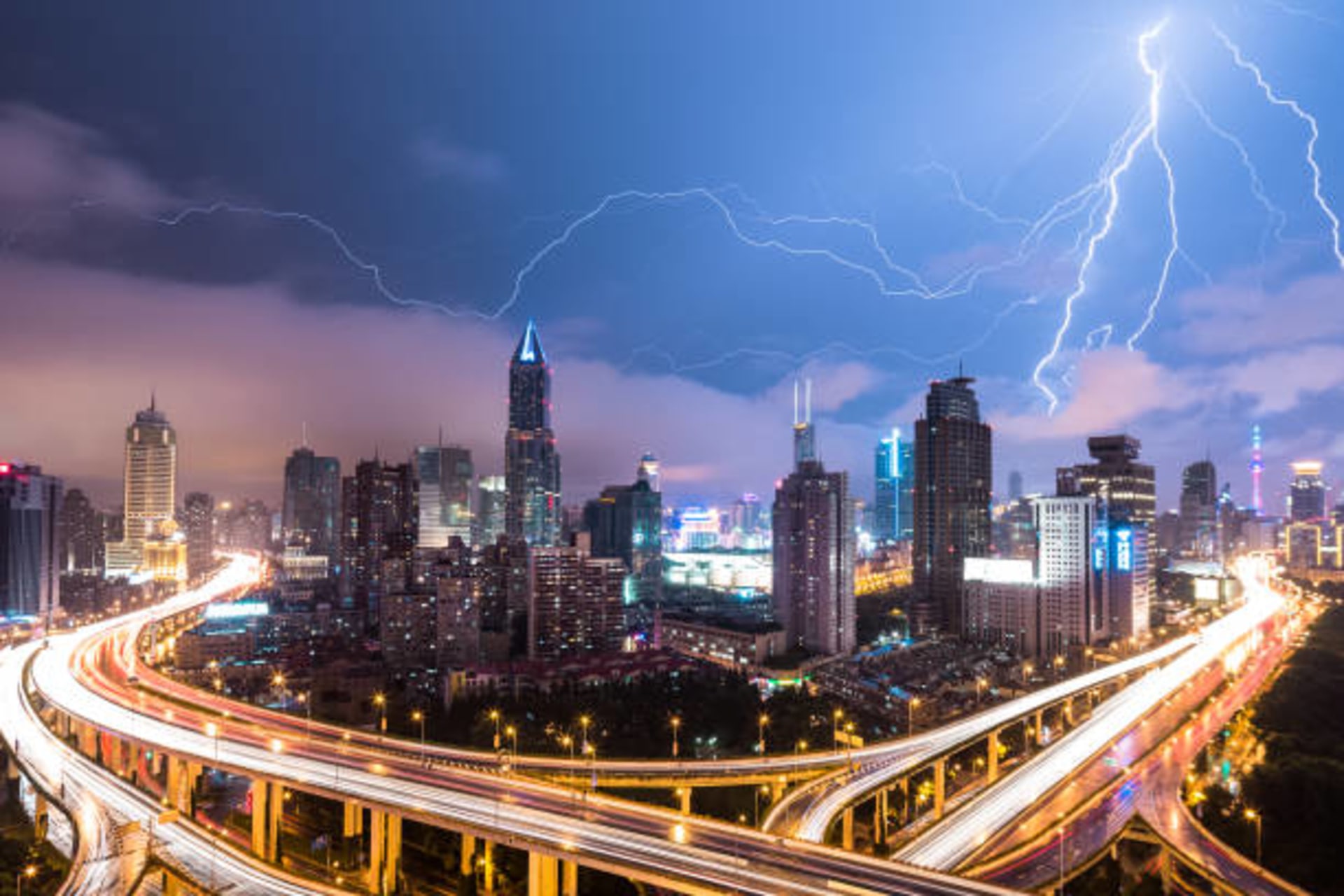 <p>Shanghai’s cityscape illuminated at night.</p>
