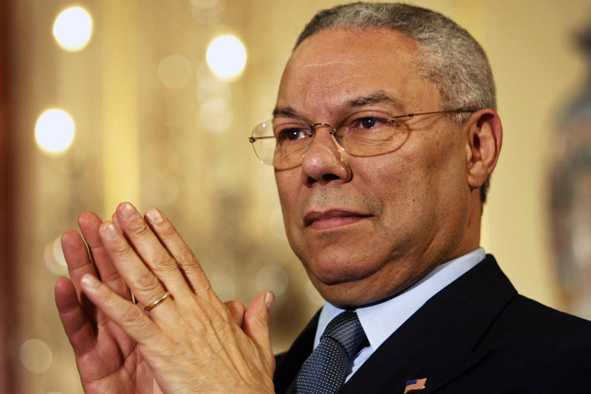 <p>Secretary of State Colin Powell listens during a speech by President George W. Bush at the State Department in 2002.</p>