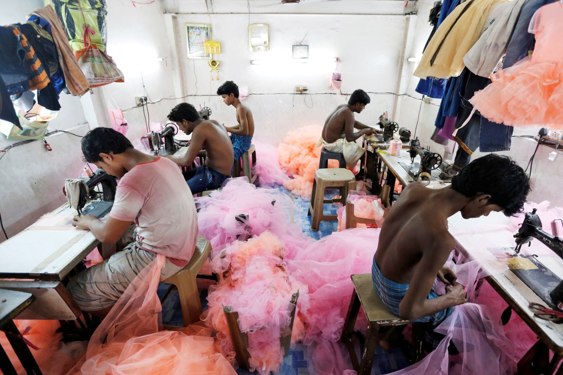 <p>Workers in a garment factory in Mumbai, India</p>