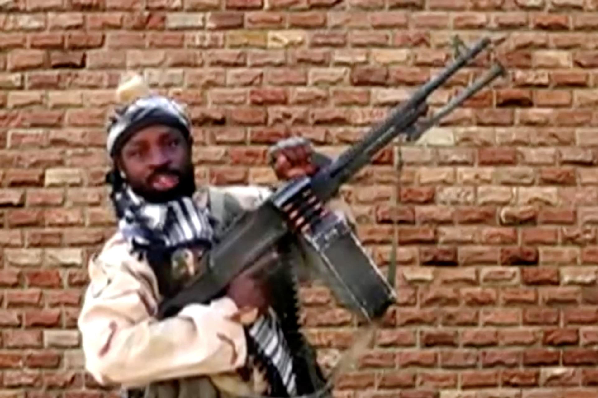 <p>Boko Haram leader Abubakar Shekau holds a weapon in an unknown location in Nigeria in this still image taken from an undated video obtained on January 15, 2018.</p>
