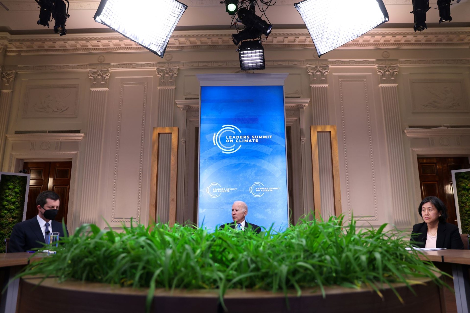 <p>U.S. President Joe Biden looks on between Transportation Secretary Pete Buttigieg, left, and United States Trade Representative Katherine Tai, right, during a virtual Climate Summit with world leaders in the East Room at the White House in Washington, D.C</p>
