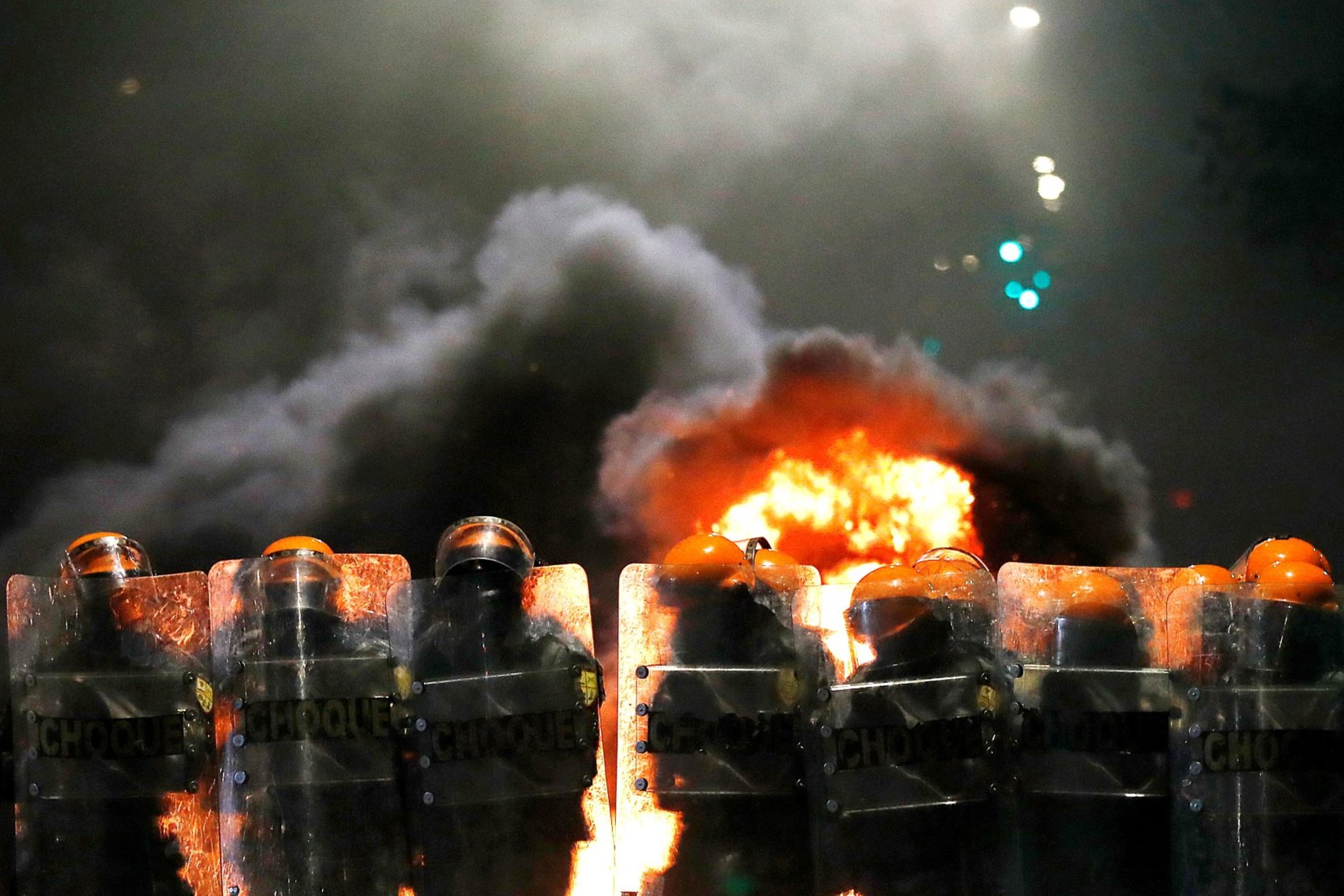 <p>Riot police stand in formation during a protest against racism, after Joao Alberto Silveira Freitas was beaten to death by security guards at a Carrefour supermarket in Porto Alegre, Brazil on November 23, 2020. </p>
