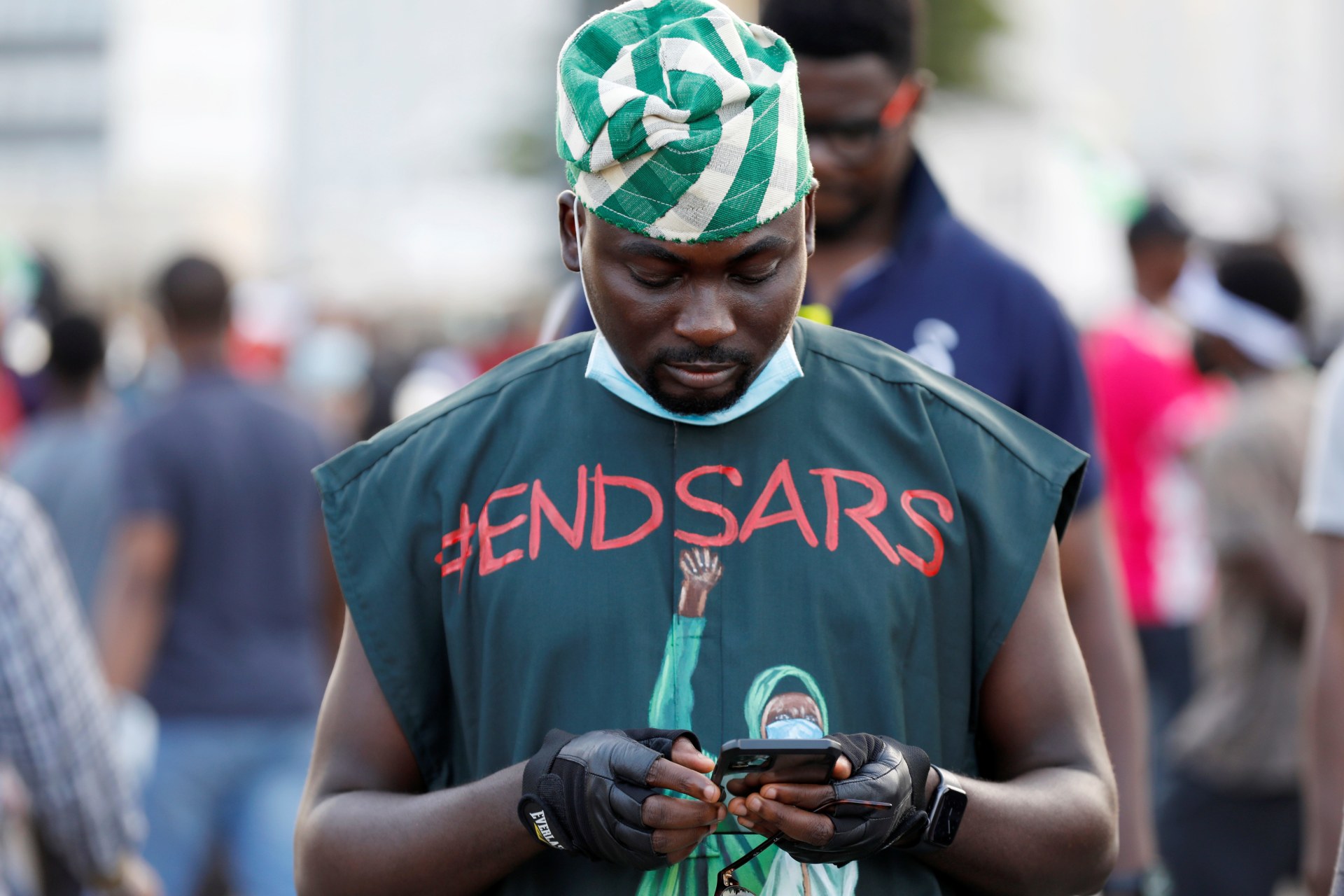 <p>“End Sars” referring to the Special Anti-Robbery Squad police unit, reads on a demonstrator’s clothes.</p>