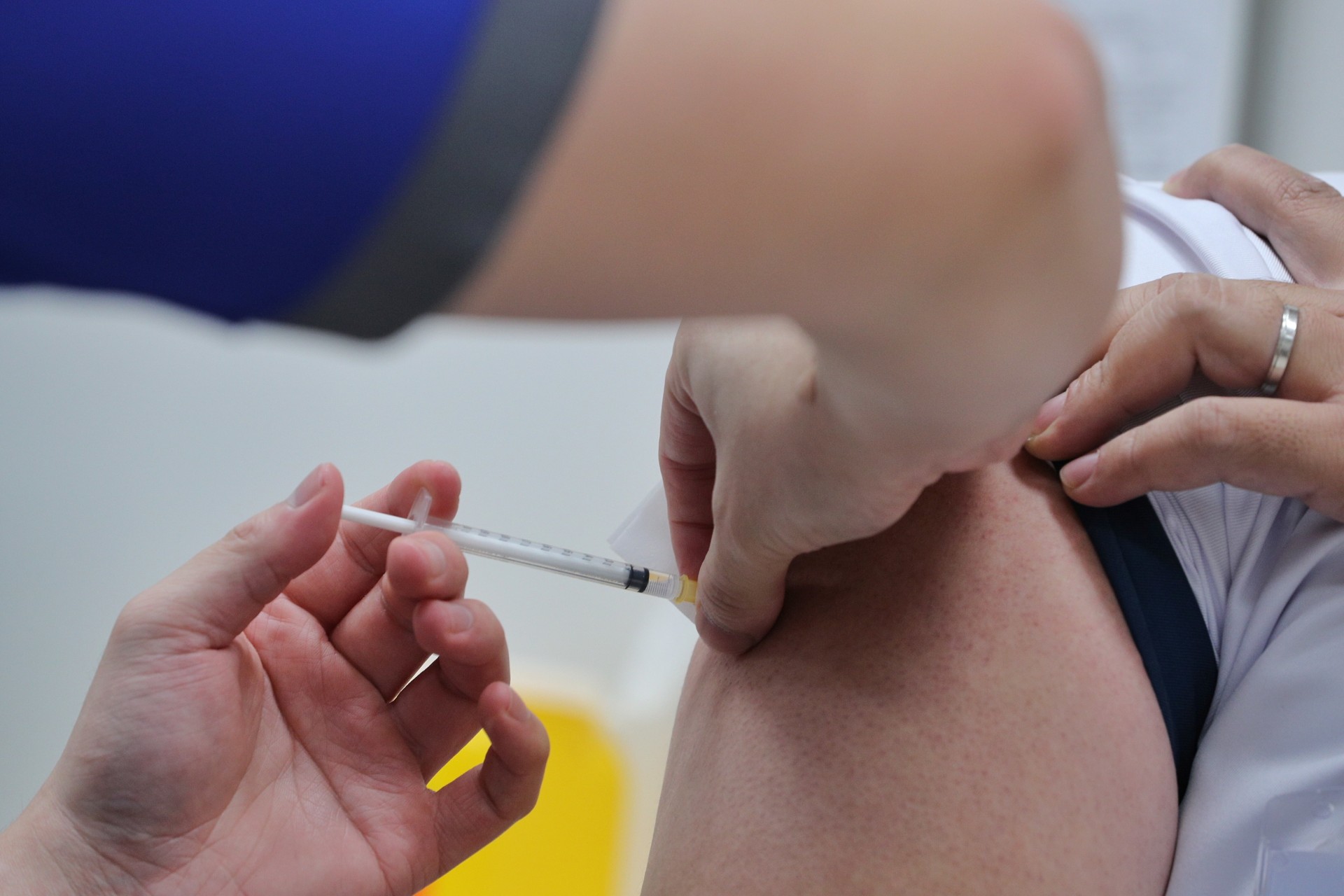<p>A healthcare worker receives the coronavirus disease (COVID-19) vaccine at the National Centre for Infectious Diseases (NCID) in Singapore on December 30, 2020</p>

