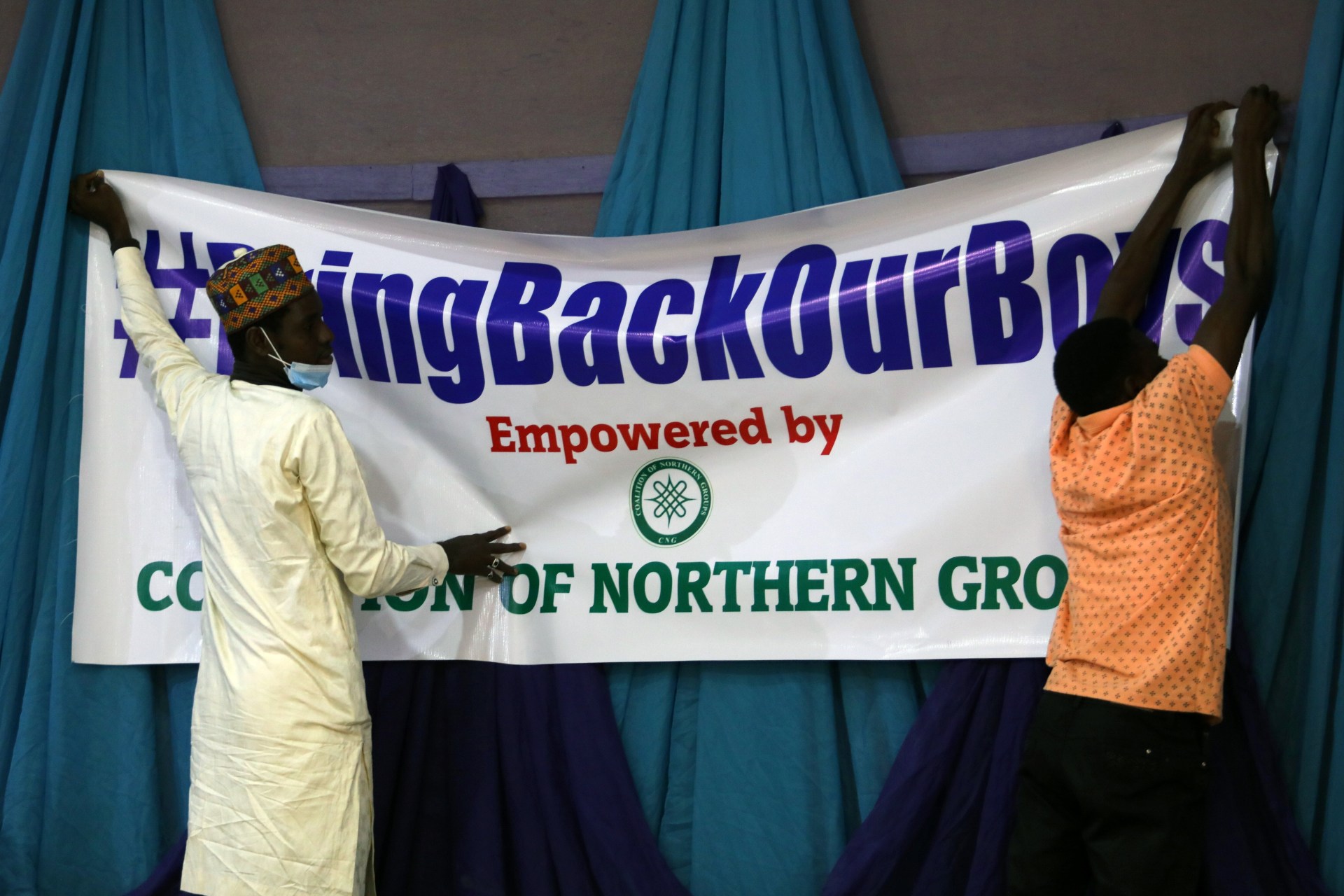 <p>People put up a sign reading “#BringBackOurBoys” during a press conference organized by the Coalition of Northern Groups following the abduction of hundreds of schoolboys, in Kankara, in northwestern Katsina State, Nigeria on December 17, 2020.</p>