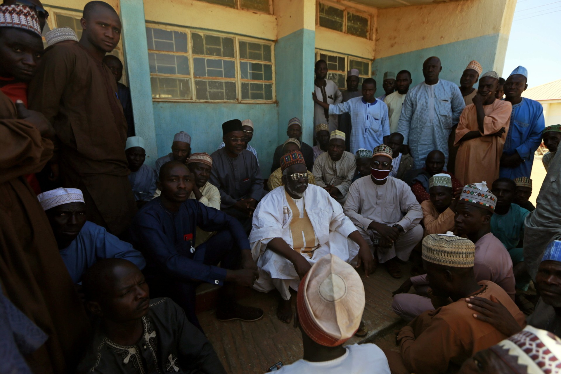 <p>Parents gather during a meeting at the Government Science school after gunmen abducted students from it, in Kankara, in northwestern Katsina state, Nigeria on December 13, 2020.</p>
