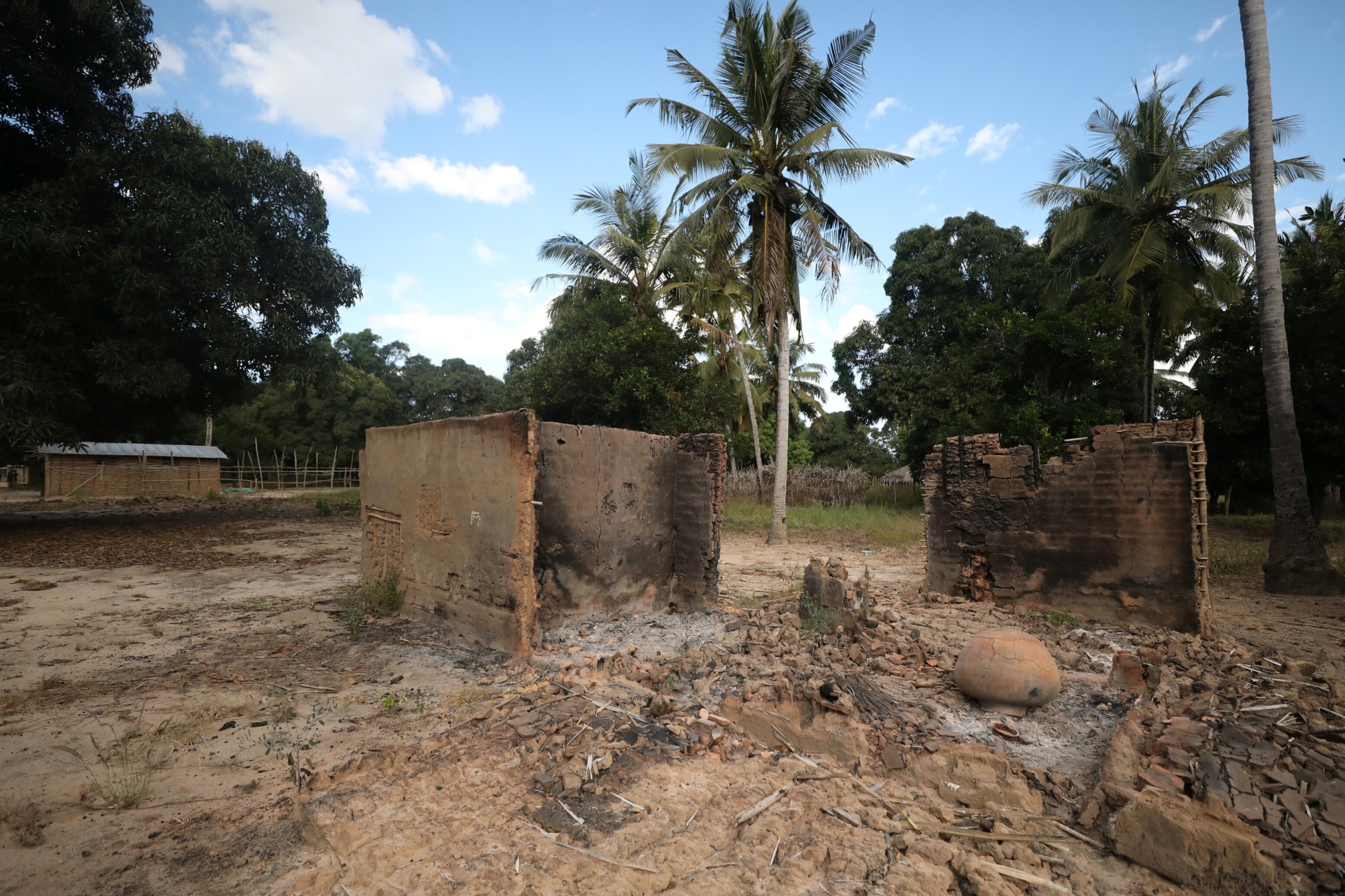 <p>Burnt-out huts are seen at the scene of an armed attack in Chitolo village, Mozambique on July 10, 2018.</p>