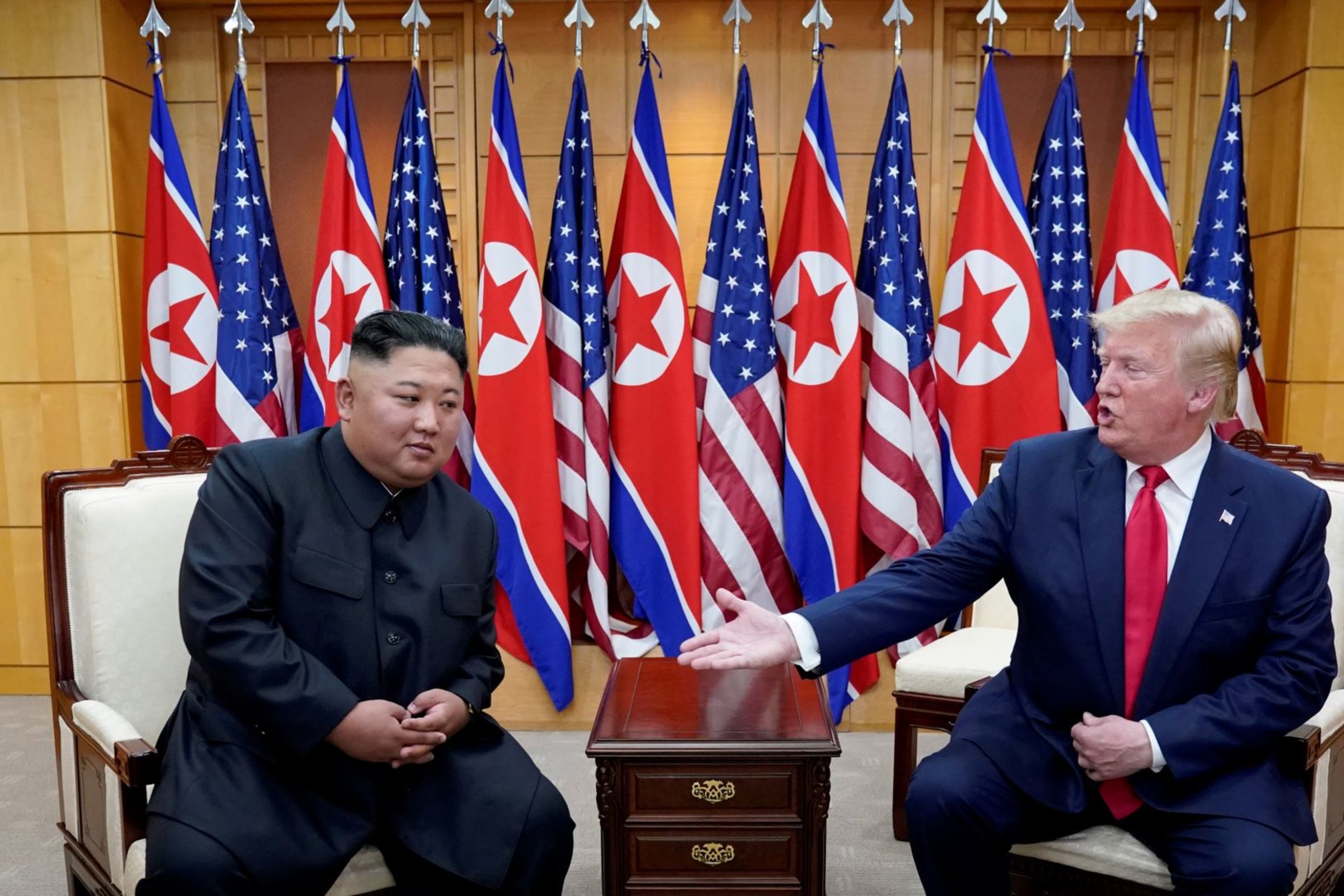 <p>U.S. President Donald J. Trump meets with North Korean leader Kim Jong Un at the demilitarized zone separating the two Koreas, in Panmunjom, South Korea on June 30, 2019. </p>