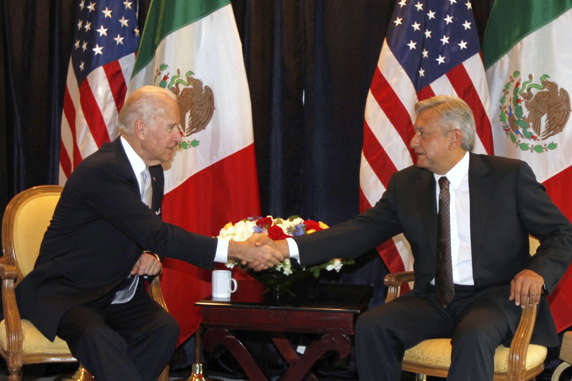 <p>U.S. Vice President Joseph Biden (L) shakes hands with Andres Manuel Lopez Obrador, presidential candidate for the Party of the Democratic Revolution (PRD) during a photo opportunity in Mexico City March 5, 2012. </p>

