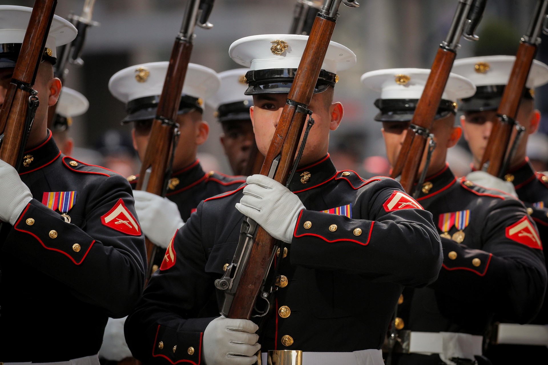 <p>U.S. Marine Corps honor guard members march in the Veterans Day Parade in New York City on November 11, 2019. Brendan McDermid/Reuters</p>
