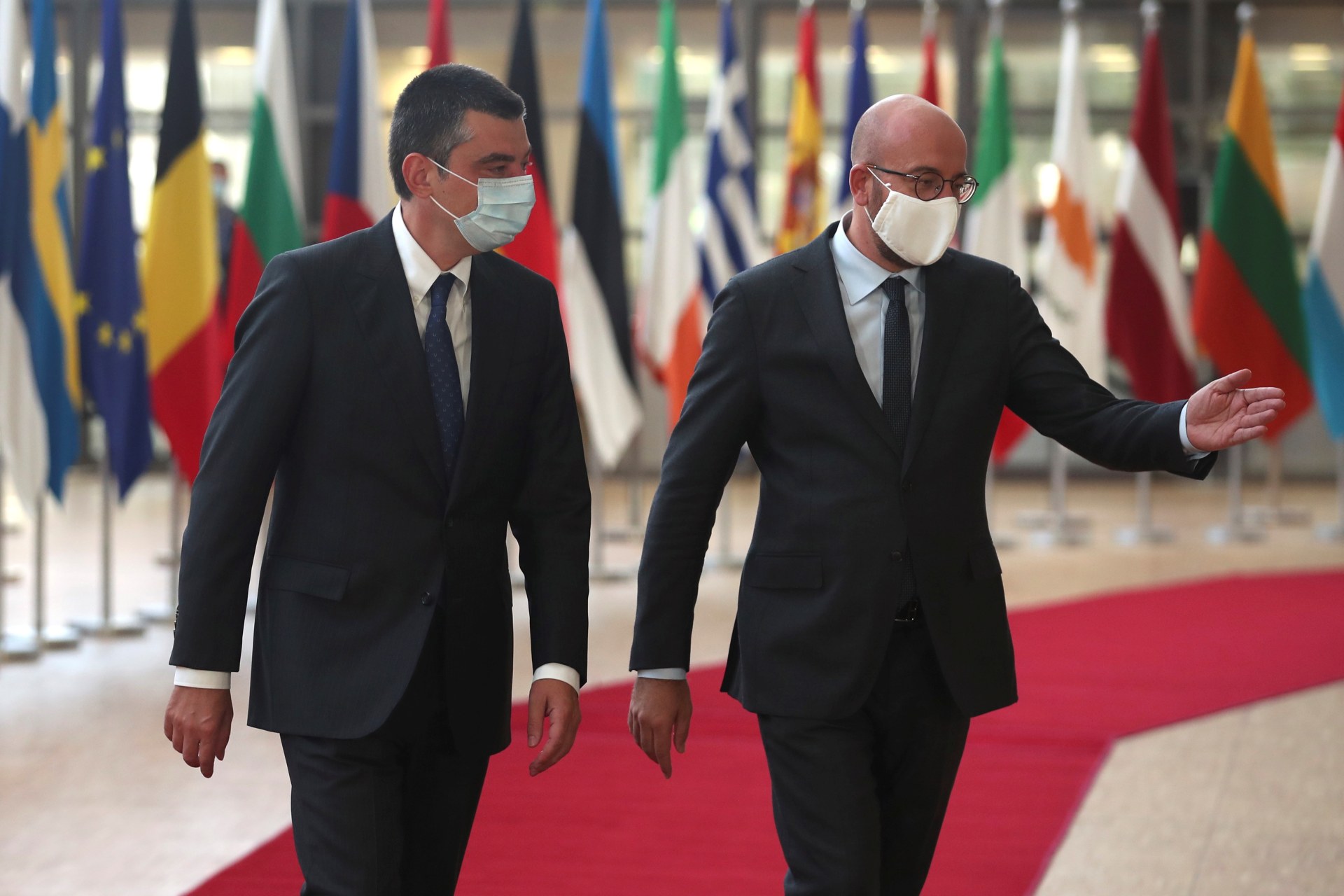 <p>Georgia’s Prime Minister Giorgi Gakharia is welcomed by European Council President Charles Michel.</p>
