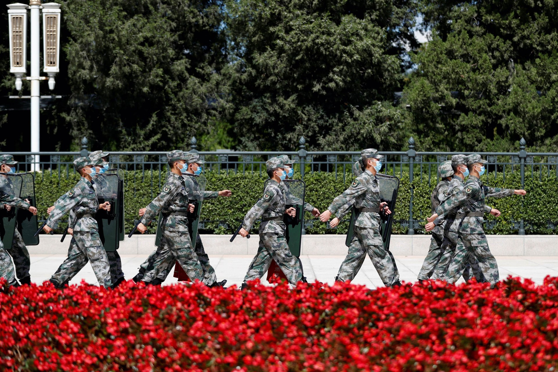 <p>Soldiers of the People’s Liberation Army march outside the Great Hall of the People in Beijing, China on September 8, 2020.</p>