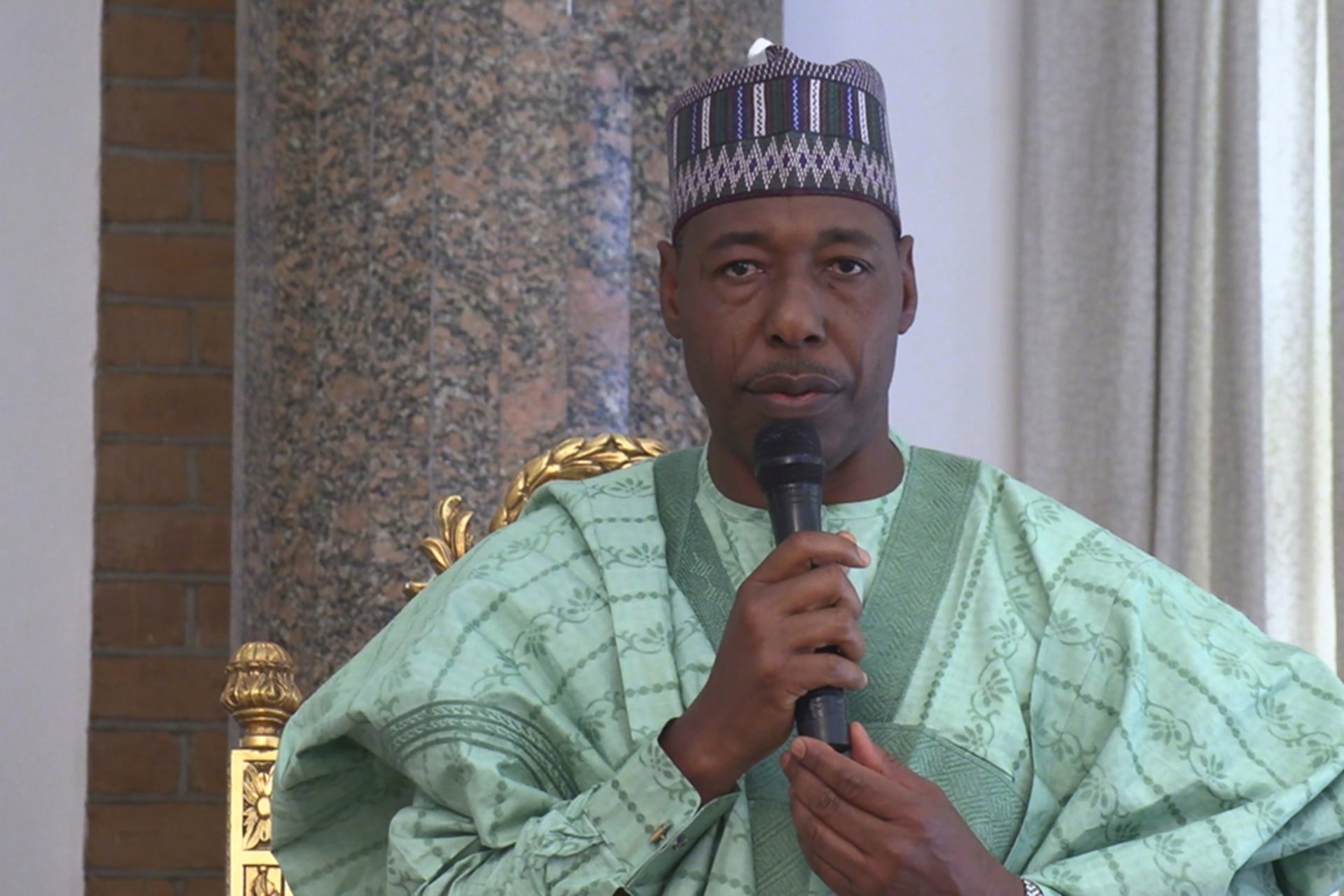 <p>Babagana Umara Zulum, the governor of Borno state, addresses people at the shehu of Borno’s palace in Maiduguri on February 12, 2020, to console with the people of the Auno community where over thirty lives were lost.</p>
