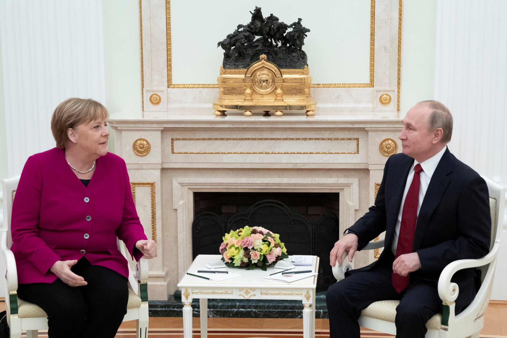 <p>German Chancellor Angela Merkel gestures during the talks with Russian President Vladimir Putin in the Kremlin.</p>