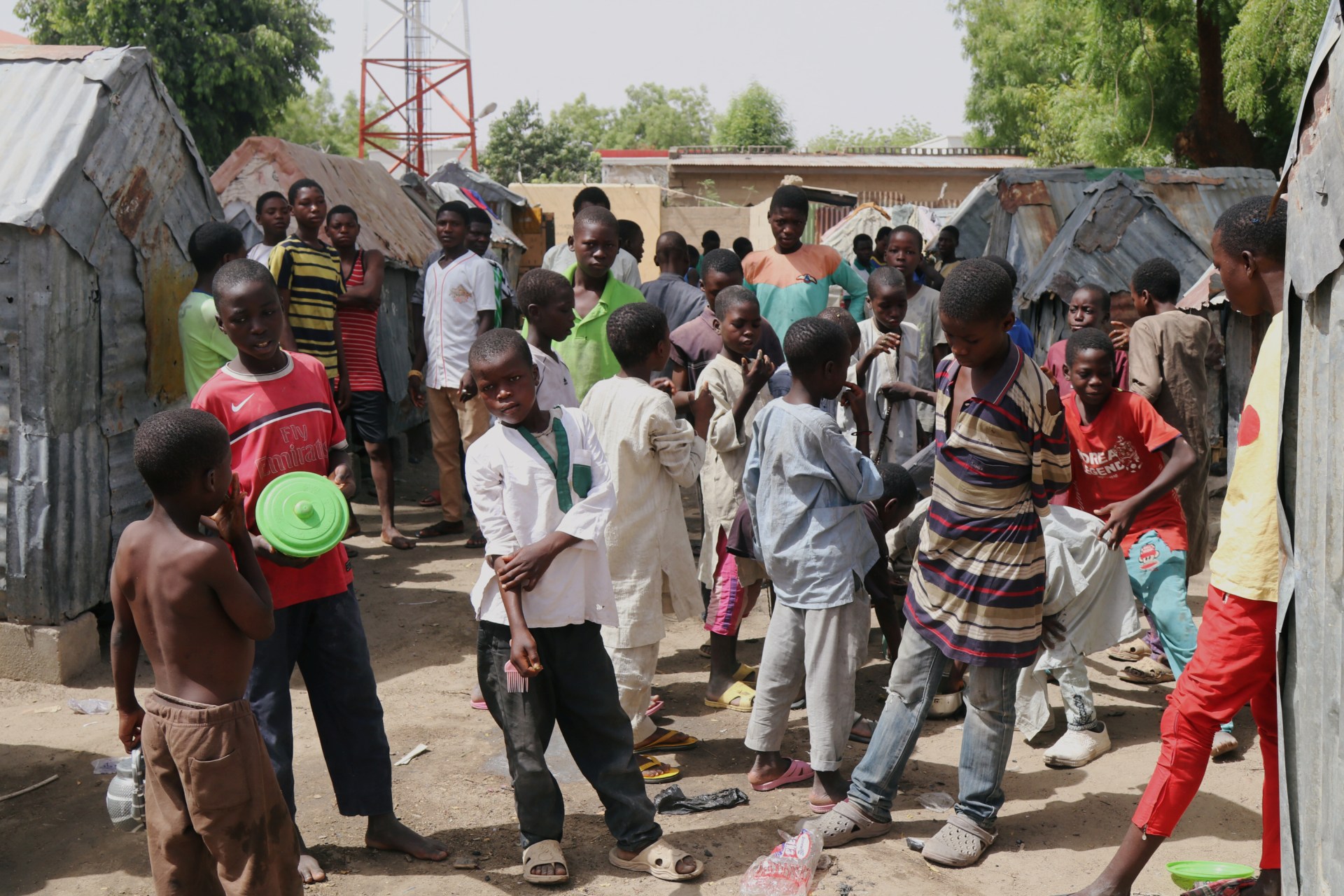 <p>Students who attend Nigeria’s Islamic schools, known as almajiris, gather in Tudunwada, as authorities struggle to contain coronavirus disease (COVID-19) in Maiduguri, Nigeria April 24, 2020.</p>
