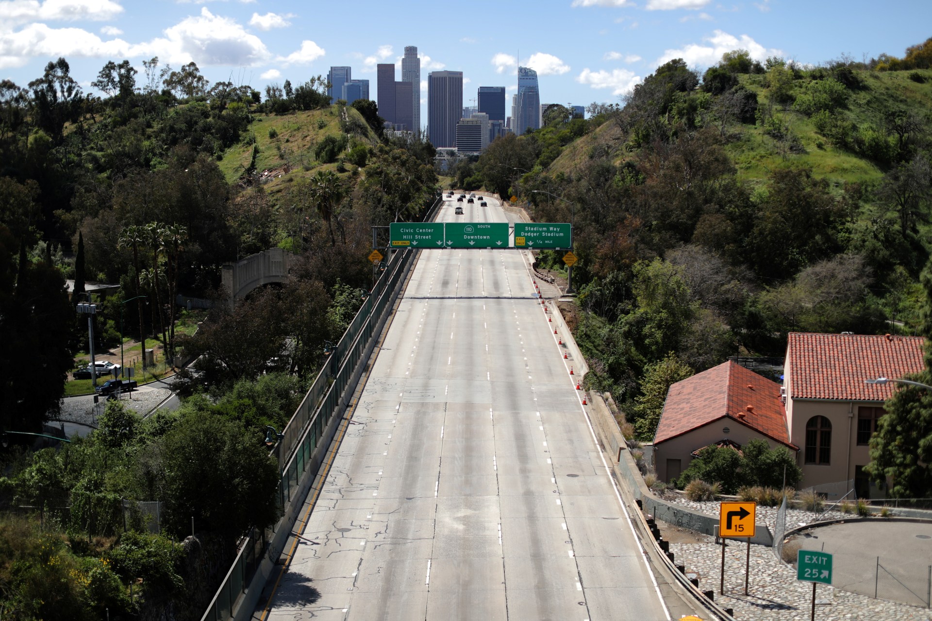 <p>The 110 freeway carries far less traffic than usual in Los Angeles, California, on March 23, 2020.</p>
