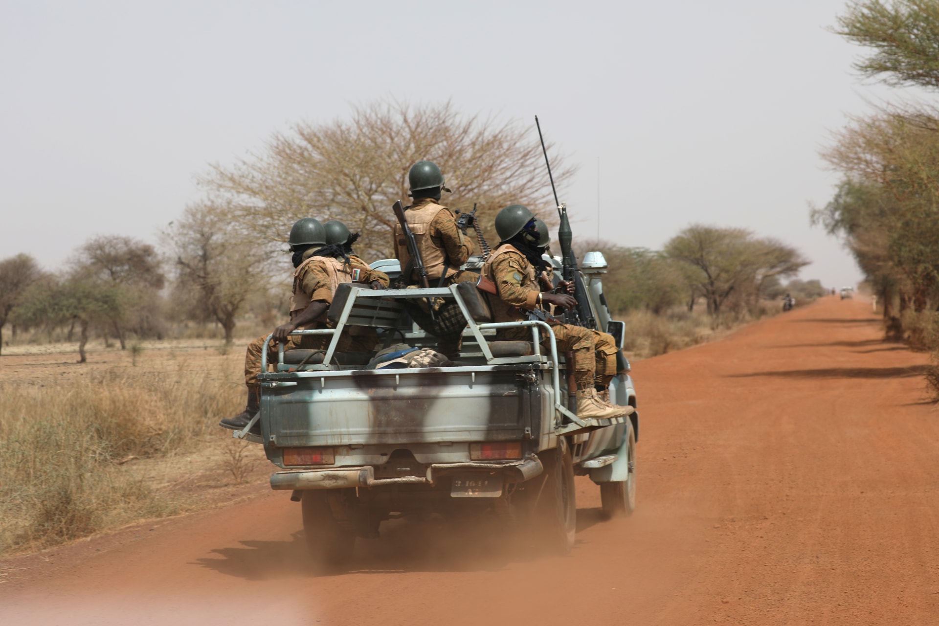 <p>Soldiers from Burkina Faso patrol on the road of Gorgadji in Sahel area, Burkina Faso, on March 3, 2019.</p>