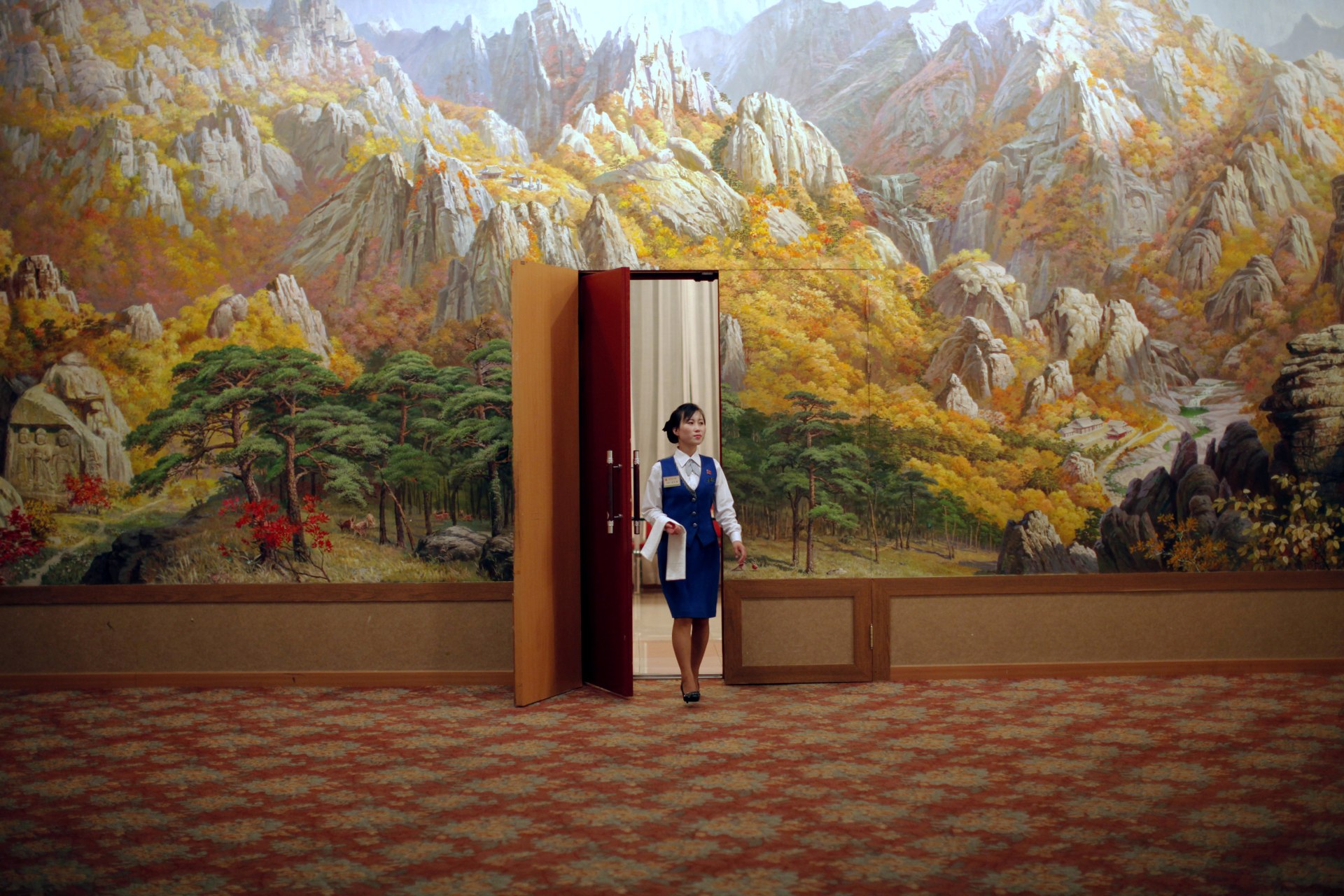 <p>An employee enters a room at a hotel in Mount Kumgang resort in Kumgang, North Korea, on September 1, 2011.</p>