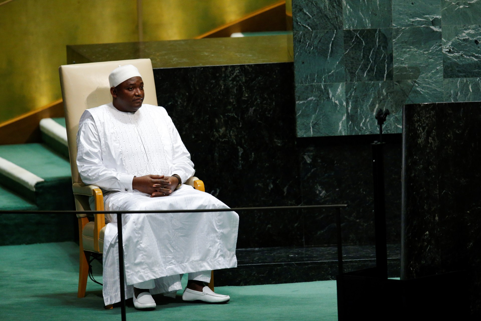 <p>Gambia’s President Adama Barrow sits in the chair reserved for heads of state before delivering his address during the seventy-third session of the United Nations General Assembly at U.N. headquarters in New York, September 25, 2018.</p>
