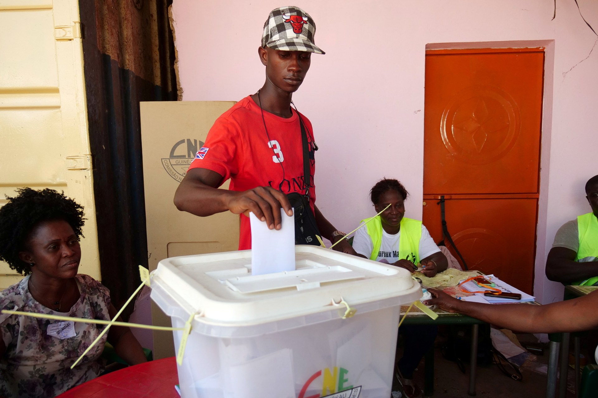 <p>A man casts his ballot at a polling station during the presidential election in Bissau, Guinea-Bissau, on November 24, 2019. </p>