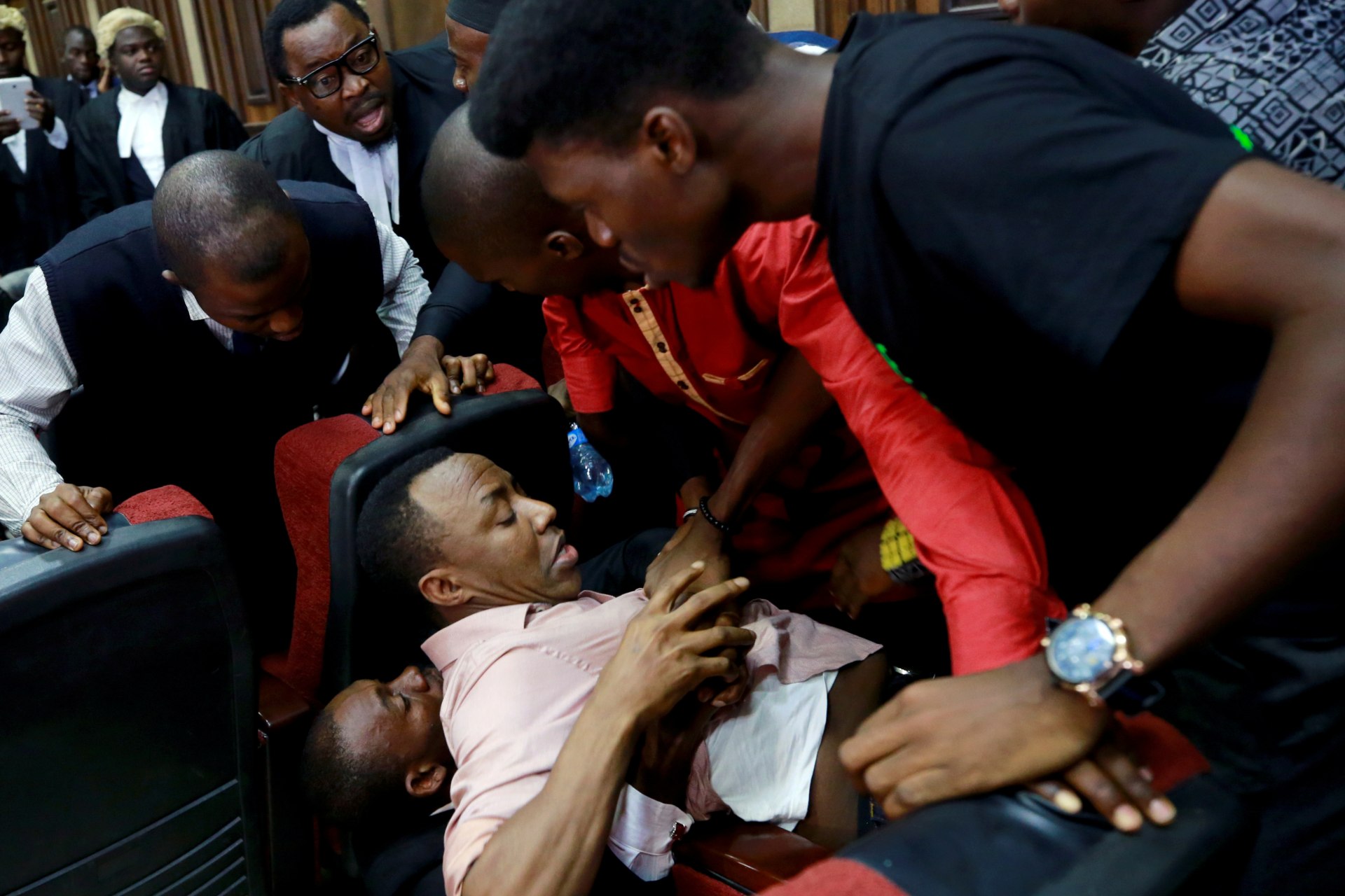 <p>A fight breaks out as security personnel attempt to re-arrest Nigerian activist Omoyele Sowore at the Federal High Court in Abuja, Nigeria, on December 6, 2019.</p>